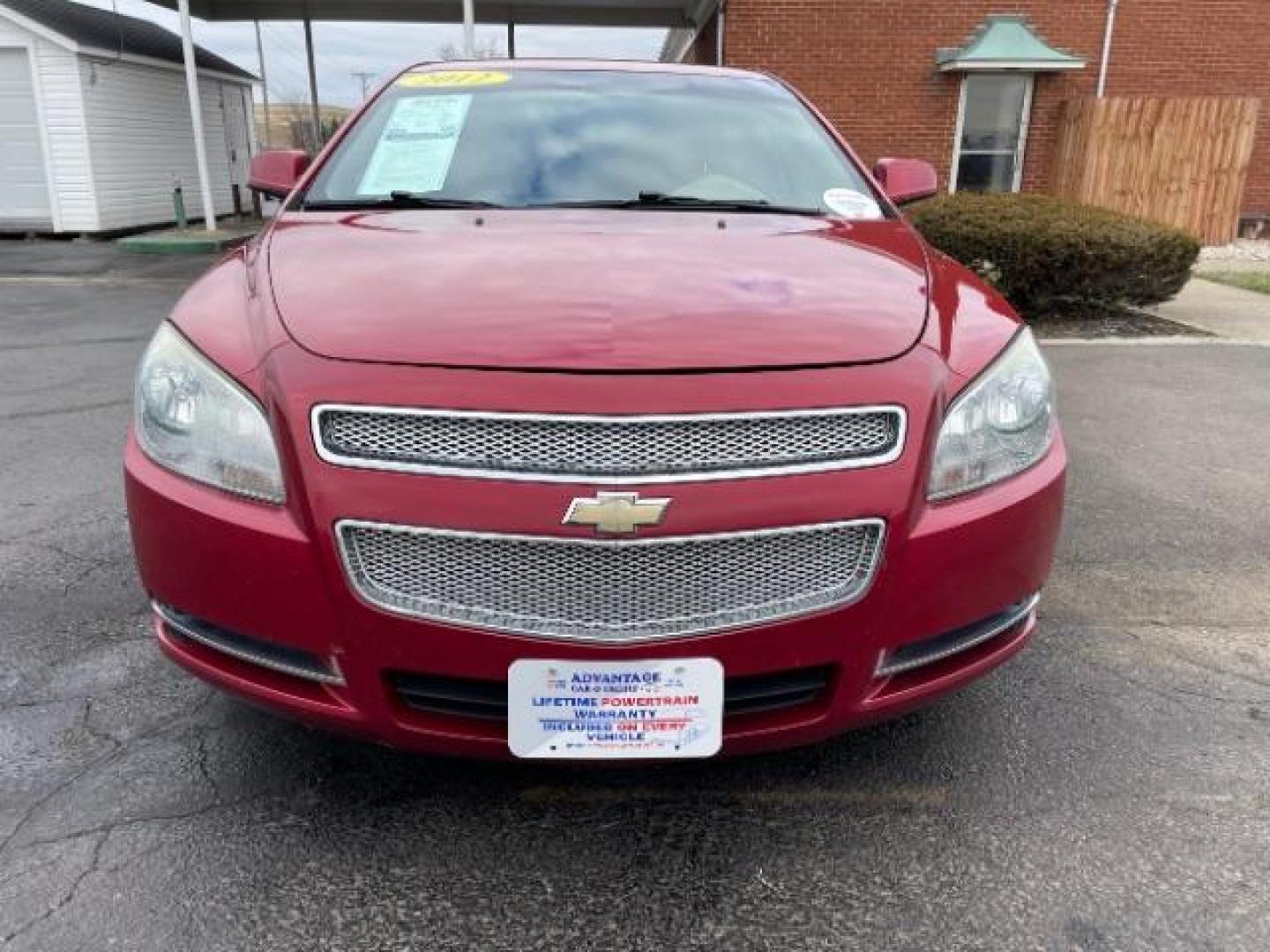 2012 Red Chevrolet Malibu 1LT (1G1ZC5E0XCF) with an 2.4L L4 DOHC 16V engine, 6-Speed Automatic transmission, located at 401 Woodman Dr, Riverside, OH, 45431, (937) 908-9800, 39.763779, -84.122063 - Photo#4