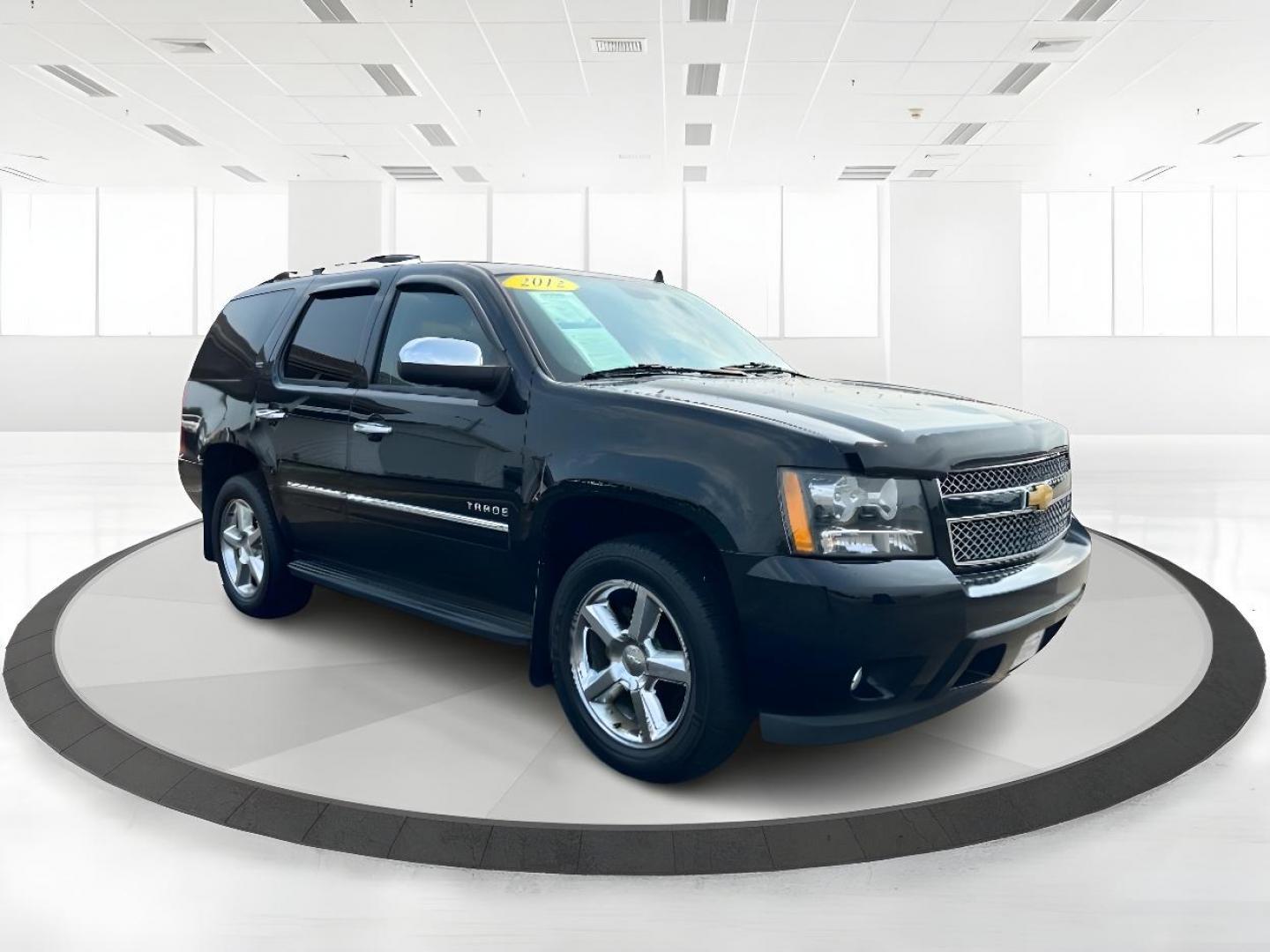 2012 Black Chevrolet Tahoe LTZ 4WD (1GNSKCE00CR) with an 5.3L V8 OHV 16V FFV engine, 6-Speed Automatic transmission, located at 401 Woodman Dr, Riverside, OH, 45431, (937) 908-9800, 39.763779, -84.122063 - Photo#0