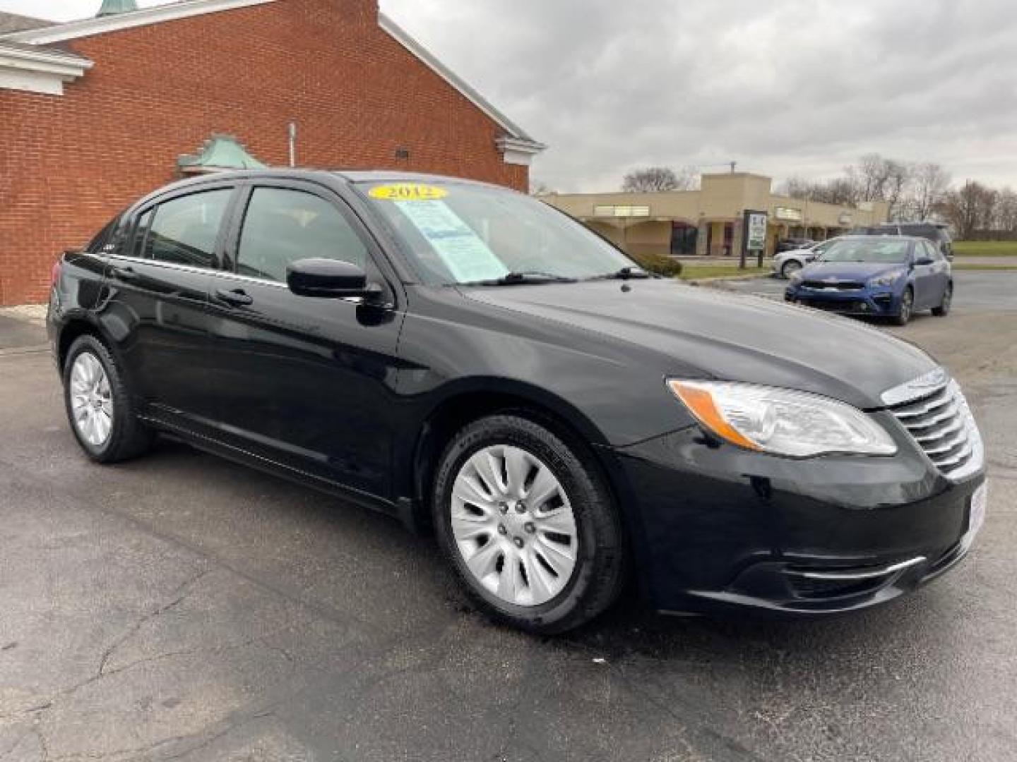 2012 Black Chrysler 200 LX (1C3CCBAB4CN) with an 2.4L L4 DOHC 16V engine, 6-Speed Automatic transmission, located at 4508 South Dixie Dr, Moraine, OH, 45439, (937) 908-9800, 39.690136, -84.216438 - Photo#0