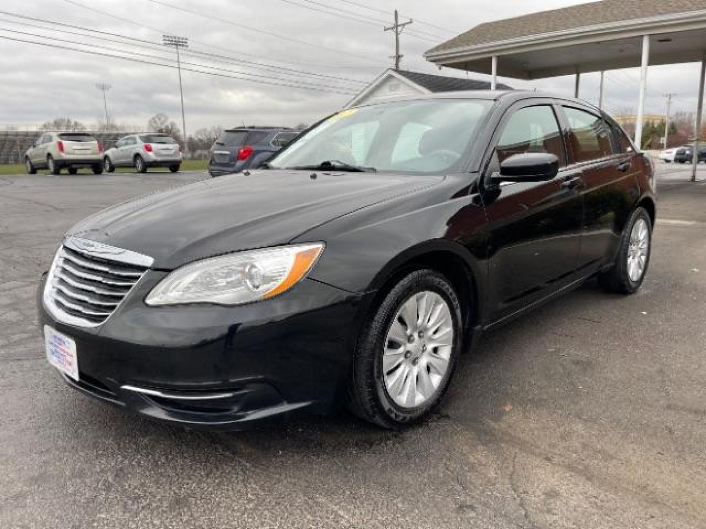 2012 Black Chrysler 200 LX (1C3CCBAB4CN) with an 2.4L L4 DOHC 16V engine, 6-Speed Automatic transmission, located at 4508 South Dixie Dr, Moraine, OH, 45439, (937) 908-9800, 39.690136, -84.216438 - Photo#1