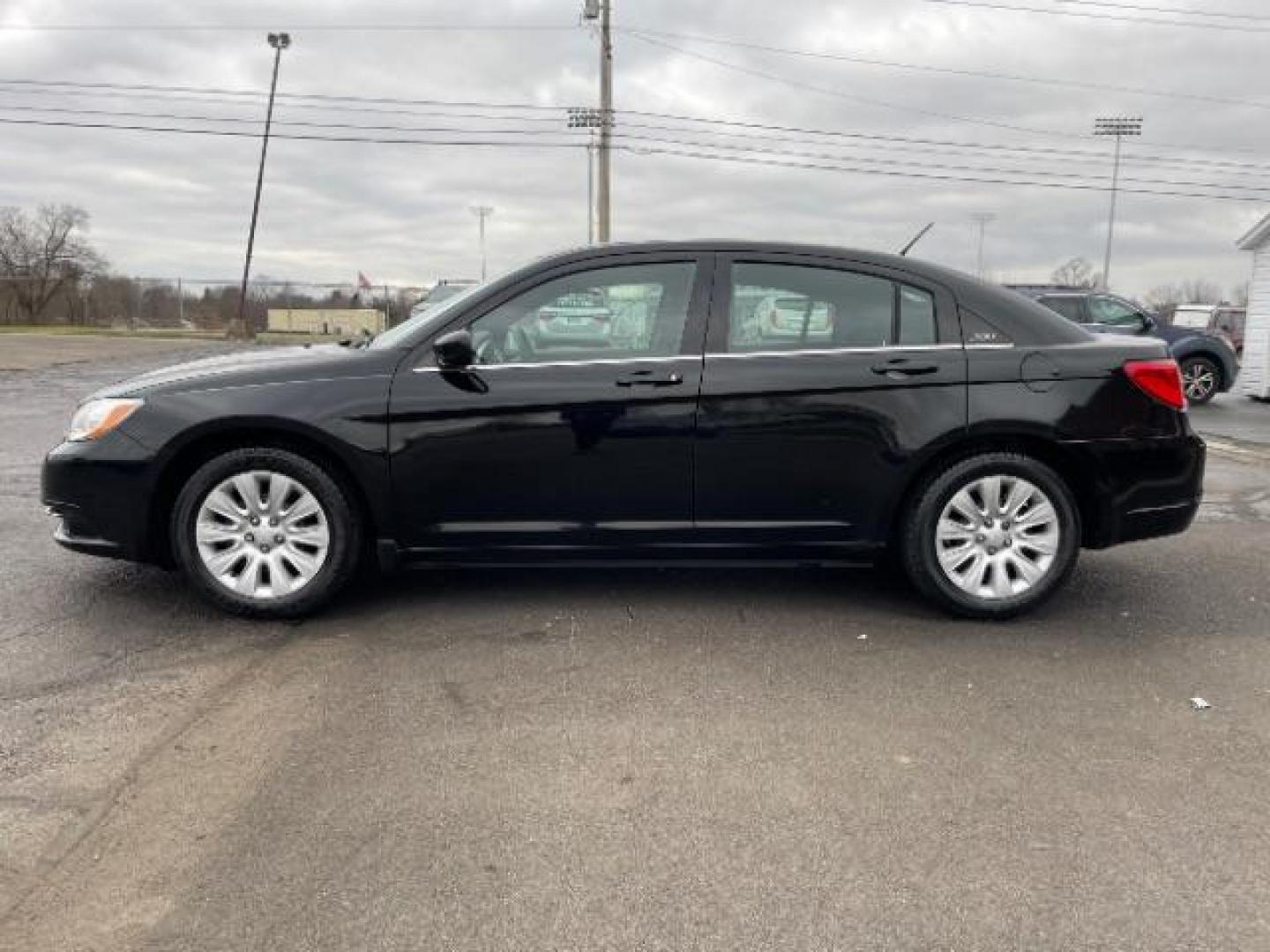 2012 Black Chrysler 200 LX (1C3CCBAB4CN) with an 2.4L L4 DOHC 16V engine, 6-Speed Automatic transmission, located at 4508 South Dixie Dr, Moraine, OH, 45439, (937) 908-9800, 39.690136, -84.216438 - Photo#2