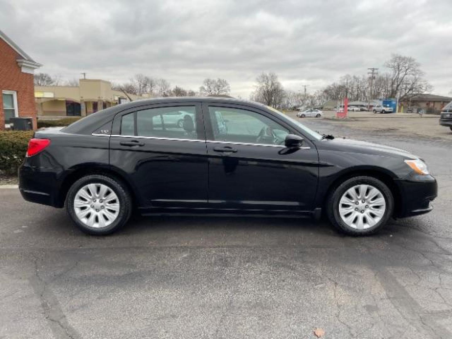 2012 Black Chrysler 200 LX (1C3CCBAB4CN) with an 2.4L L4 DOHC 16V engine, 6-Speed Automatic transmission, located at 4508 South Dixie Dr, Moraine, OH, 45439, (937) 908-9800, 39.690136, -84.216438 - Photo#3