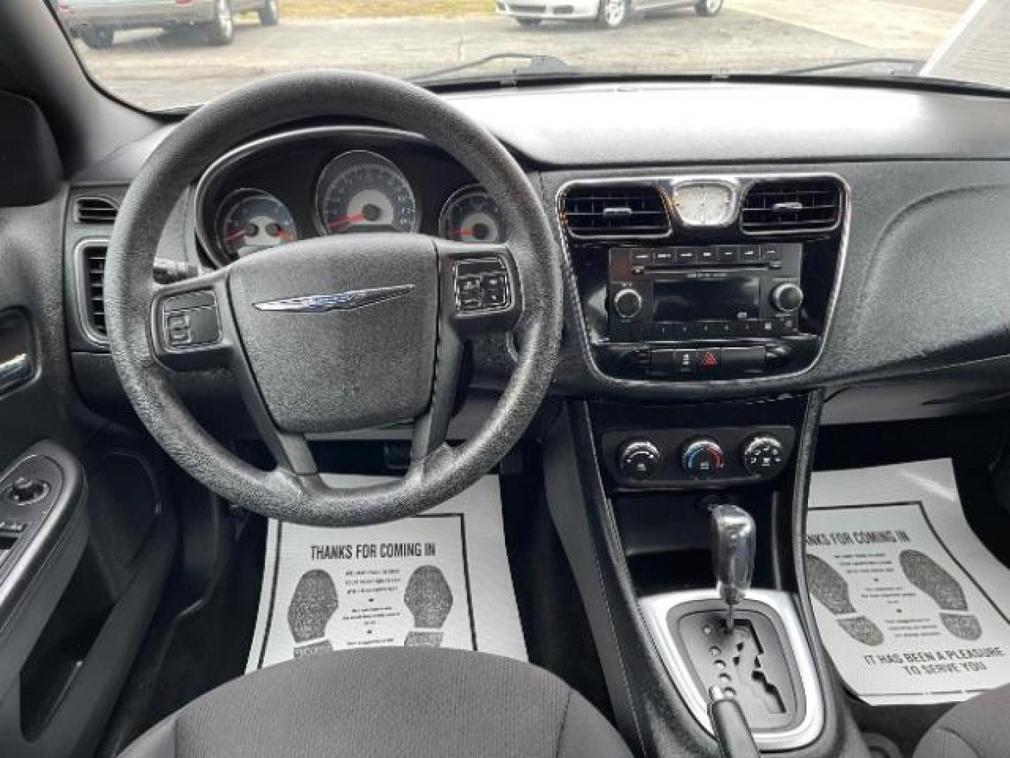 2012 Black Chrysler 200 LX (1C3CCBAB4CN) with an 2.4L L4 DOHC 16V engine, 6-Speed Automatic transmission, located at 4508 South Dixie Dr, Moraine, OH, 45439, (937) 908-9800, 39.690136, -84.216438 - Photo#7