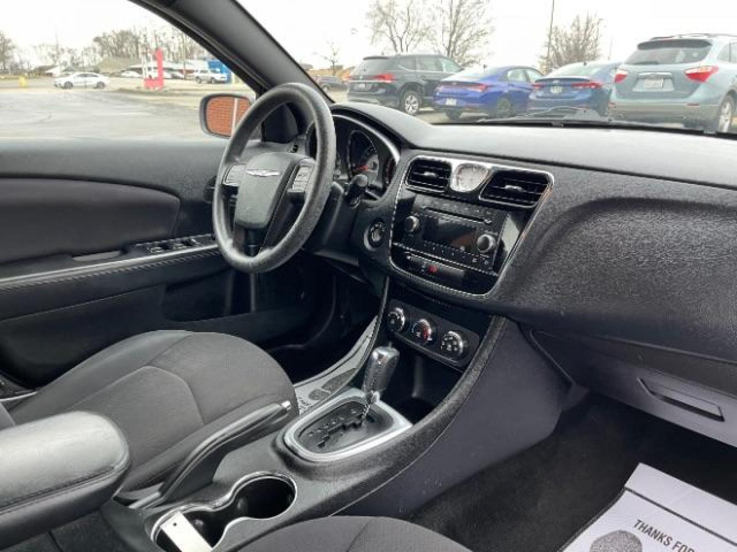 2012 Black Chrysler 200 LX (1C3CCBAB4CN) with an 2.4L L4 DOHC 16V engine, 6-Speed Automatic transmission, located at 4508 South Dixie Dr, Moraine, OH, 45439, (937) 908-9800, 39.690136, -84.216438 - Photo#8