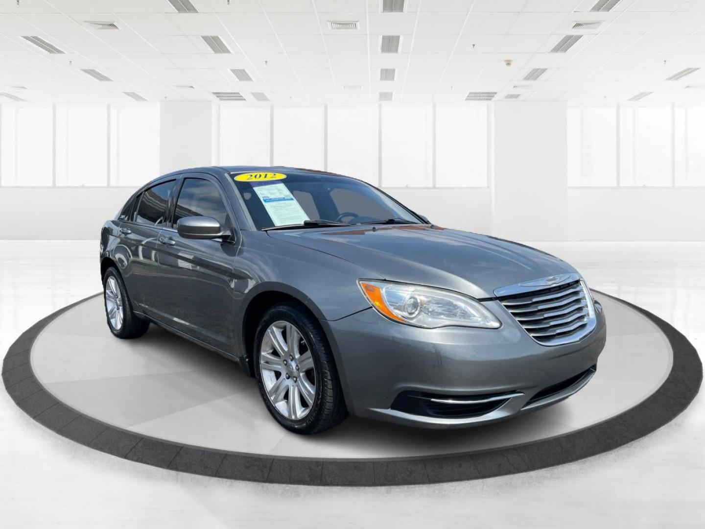 2012 Tungsten Metallic Chrysler 200 Touring (1C3CCBBB1CN) with an 2.4L L4 DOHC 16V engine, 6-Speed Automatic transmission, located at 4508 South Dixie Dr, Moraine, OH, 45439, (937) 908-9800, 39.690136, -84.216438 - Photo#0