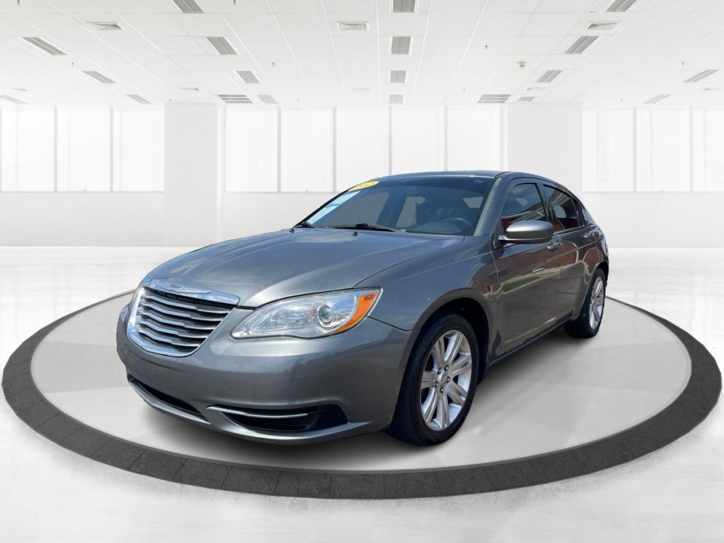 2012 Tungsten Metallic Chrysler 200 Touring (1C3CCBBB1CN) with an 2.4L L4 DOHC 16V engine, 6-Speed Automatic transmission, located at 4508 South Dixie Dr, Moraine, OH, 45439, (937) 908-9800, 39.690136, -84.216438 - Photo#7