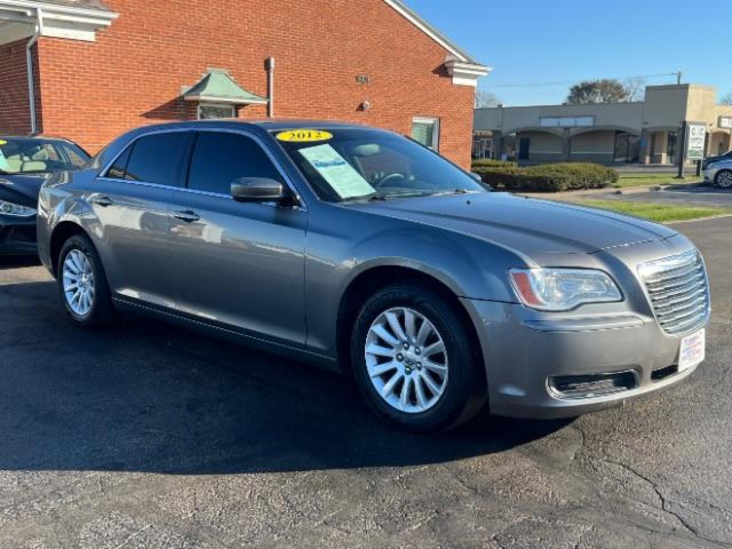 2012 Tungsten Metallic Chrysler 300 Base (2C3CCAAG9CH) with an 3.6L V6 SOHC 24V engine, 5-Speed Automatic transmission, located at 880 E. National Road, Vandalia, OH, 45377, (937) 908-9800, 39.892189, -84.181015 - Photo#0