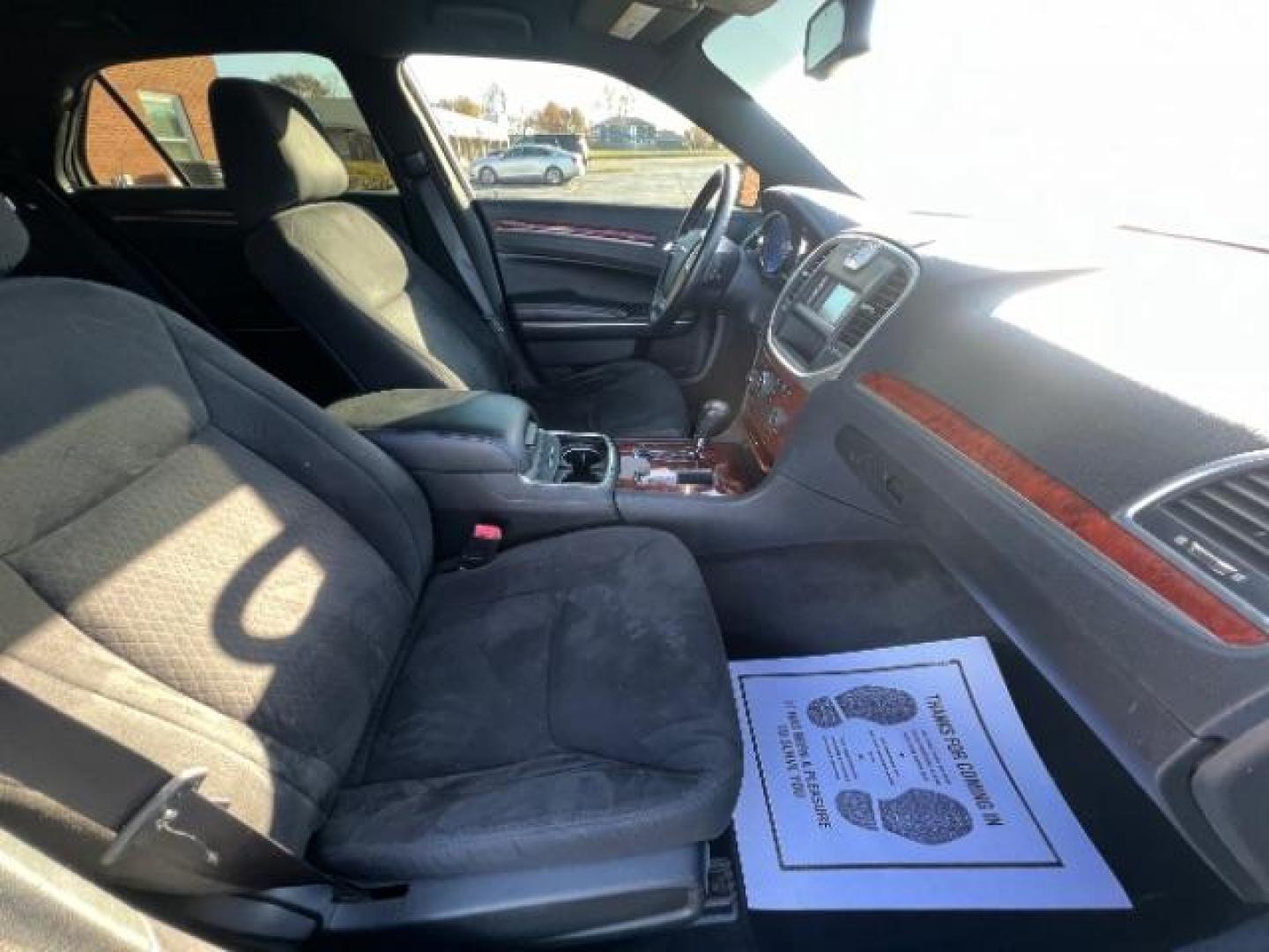 2012 Tungsten Metallic Chrysler 300 Base (2C3CCAAG9CH) with an 3.6L V6 SOHC 24V engine, 5-Speed Automatic transmission, located at 880 E. National Road, Vandalia, OH, 45377, (937) 908-9800, 39.892189, -84.181015 - Photo#9