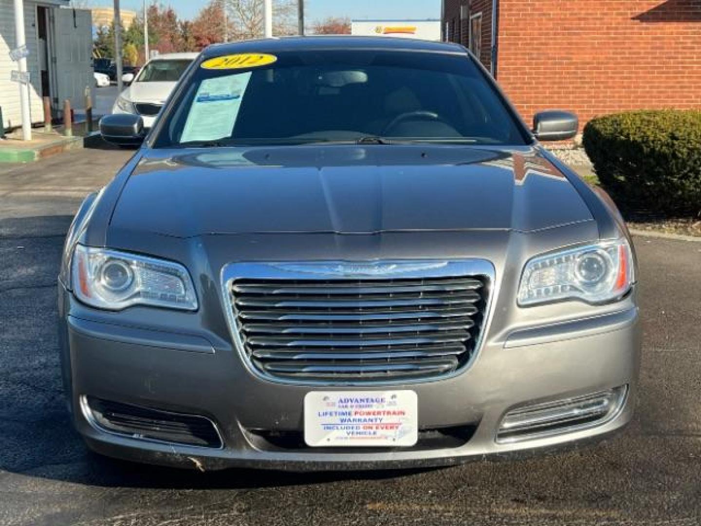 2012 Tungsten Metallic Chrysler 300 Base (2C3CCAAG9CH) with an 3.6L V6 SOHC 24V engine, 5-Speed Automatic transmission, located at 880 E. National Road, Vandalia, OH, 45377, (937) 908-9800, 39.892189, -84.181015 - Photo#1