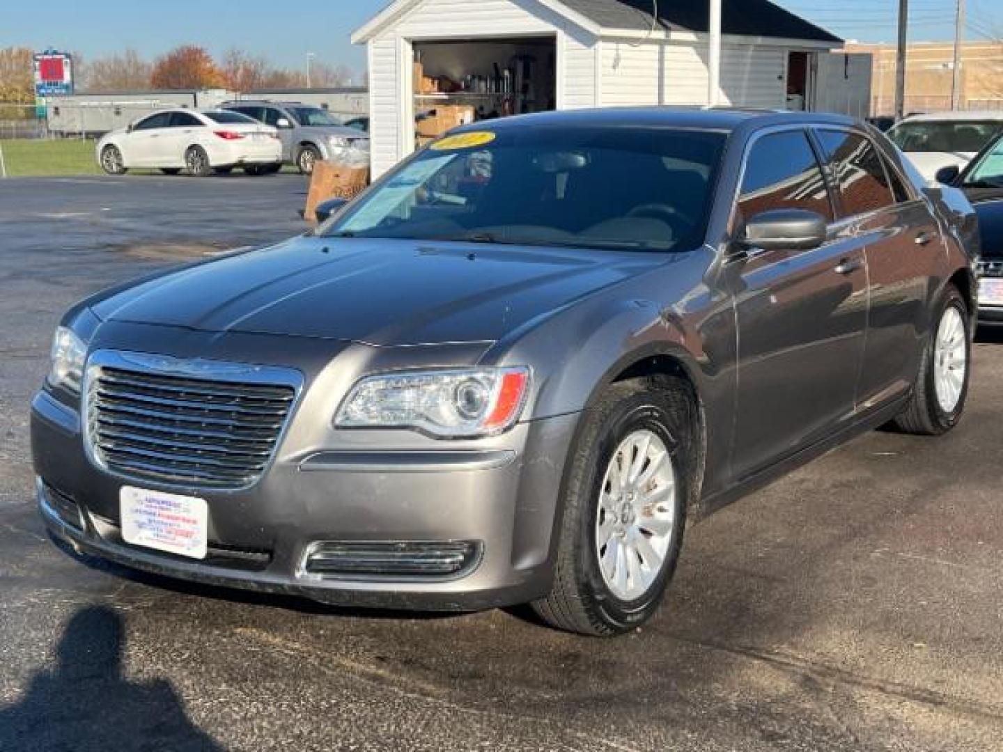 2012 Tungsten Metallic Chrysler 300 Base (2C3CCAAG9CH) with an 3.6L V6 SOHC 24V engine, 5-Speed Automatic transmission, located at 880 E. National Road, Vandalia, OH, 45377, (937) 908-9800, 39.892189, -84.181015 - Photo#2