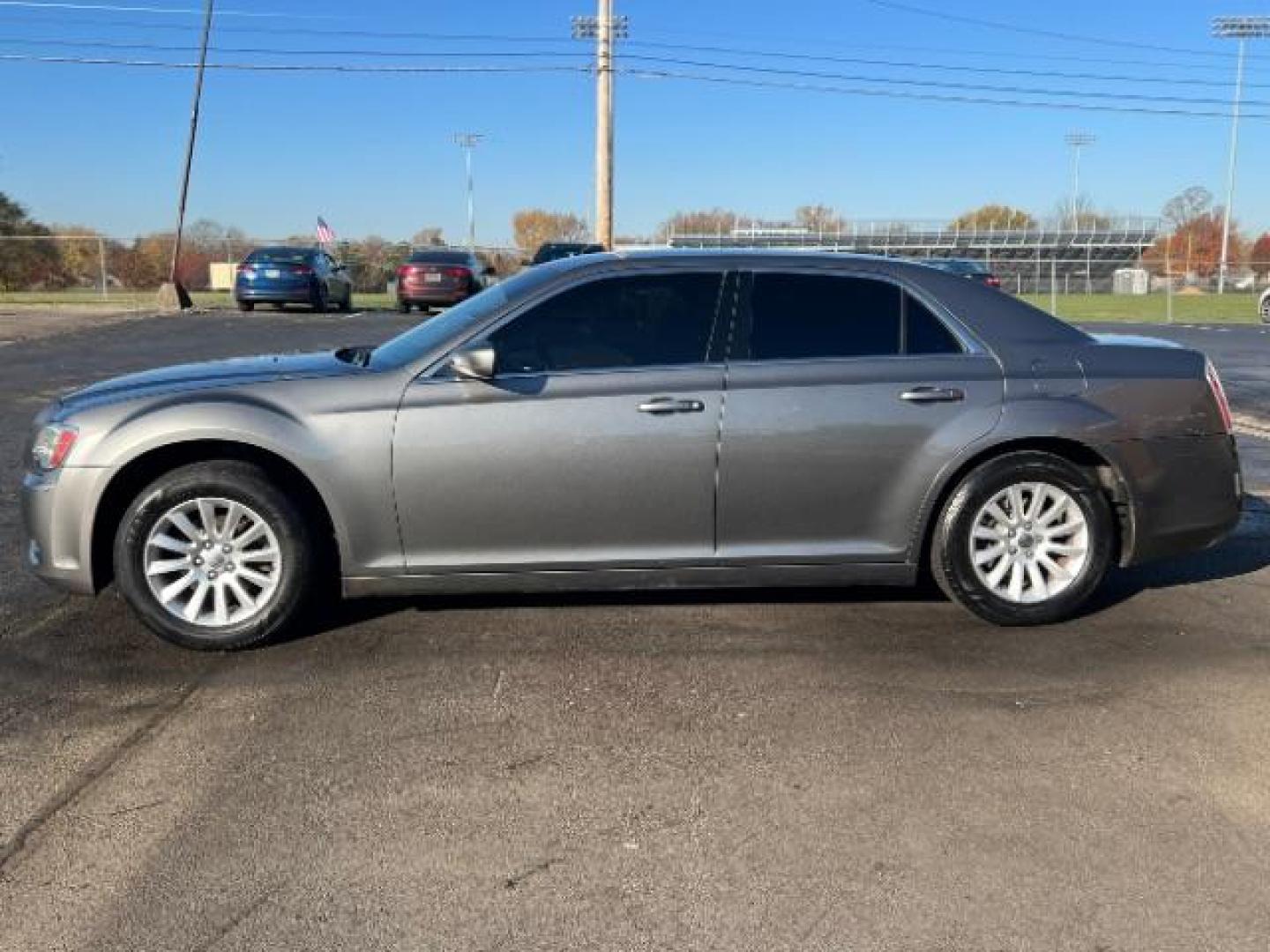 2012 Tungsten Metallic Chrysler 300 Base (2C3CCAAG9CH) with an 3.6L V6 SOHC 24V engine, 5-Speed Automatic transmission, located at 880 E. National Road, Vandalia, OH, 45377, (937) 908-9800, 39.892189, -84.181015 - Photo#3