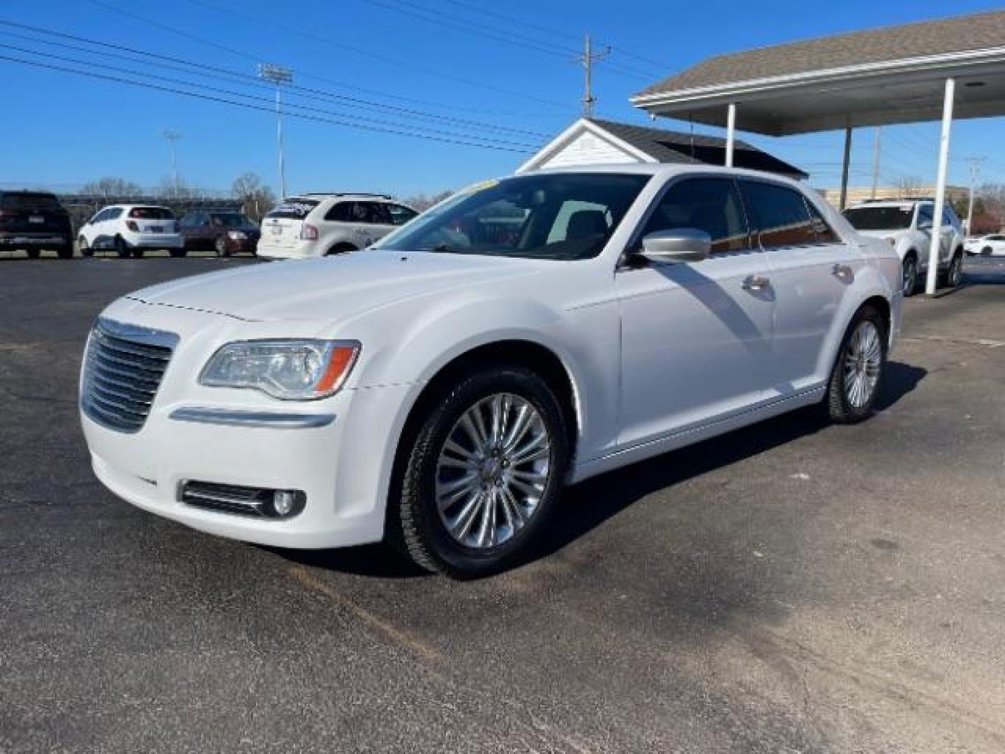 2012 Bright White Chrysler 300 C AWD (2C3CCAST7CH) with an 5.7L V8 OHV 16V engine, 5-Speed Automatic transmission, located at 1099 N County Rd 25A, OH, 45373, (937) 908-9800, 40.057079, -84.212883 - Photo#1