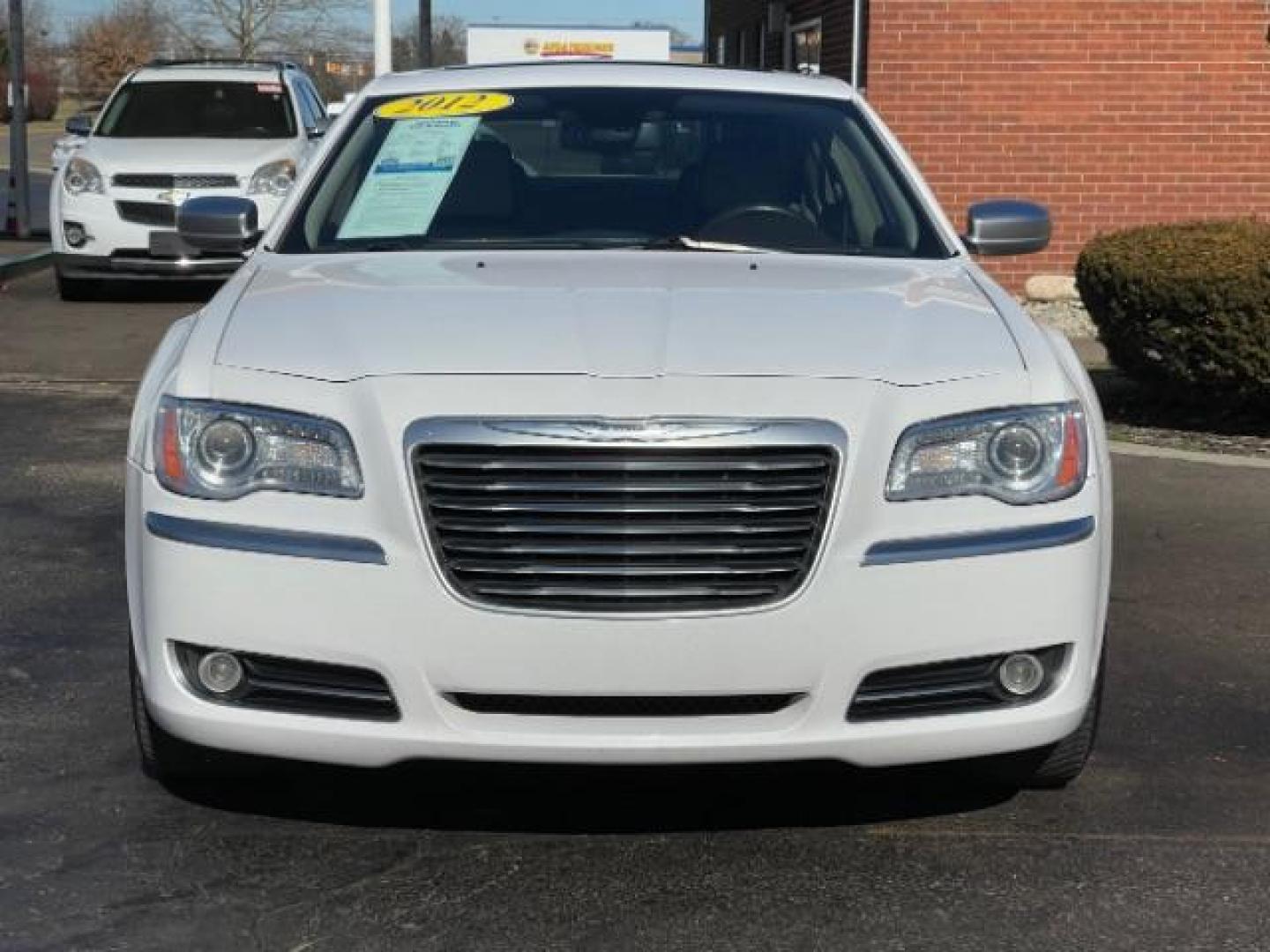 2012 Bright White Chrysler 300 C AWD (2C3CCAST7CH) with an 5.7L V8 OHV 16V engine, 5-Speed Automatic transmission, located at 1099 N County Rd 25A, OH, 45373, (937) 908-9800, 40.057079, -84.212883 - Photo#4