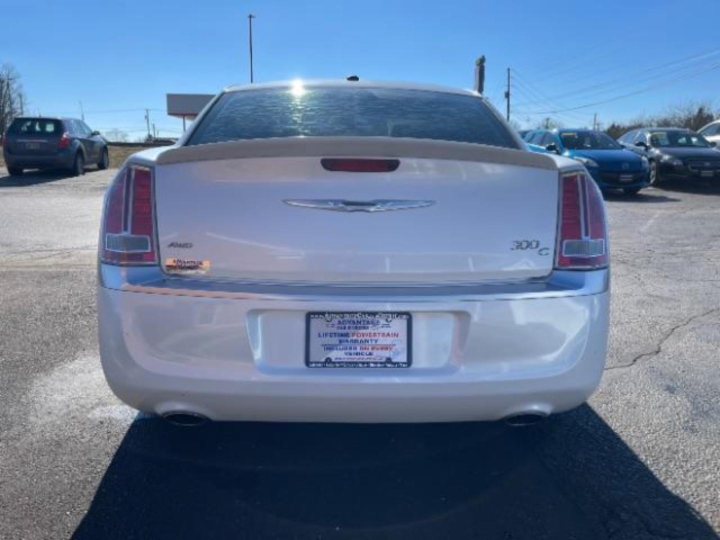 2012 Bright White Chrysler 300 C AWD (2C3CCAST7CH) with an 5.7L V8 OHV 16V engine, 5-Speed Automatic transmission, located at 1099 N County Rd 25A, OH, 45373, (937) 908-9800, 40.057079, -84.212883 - Photo#5