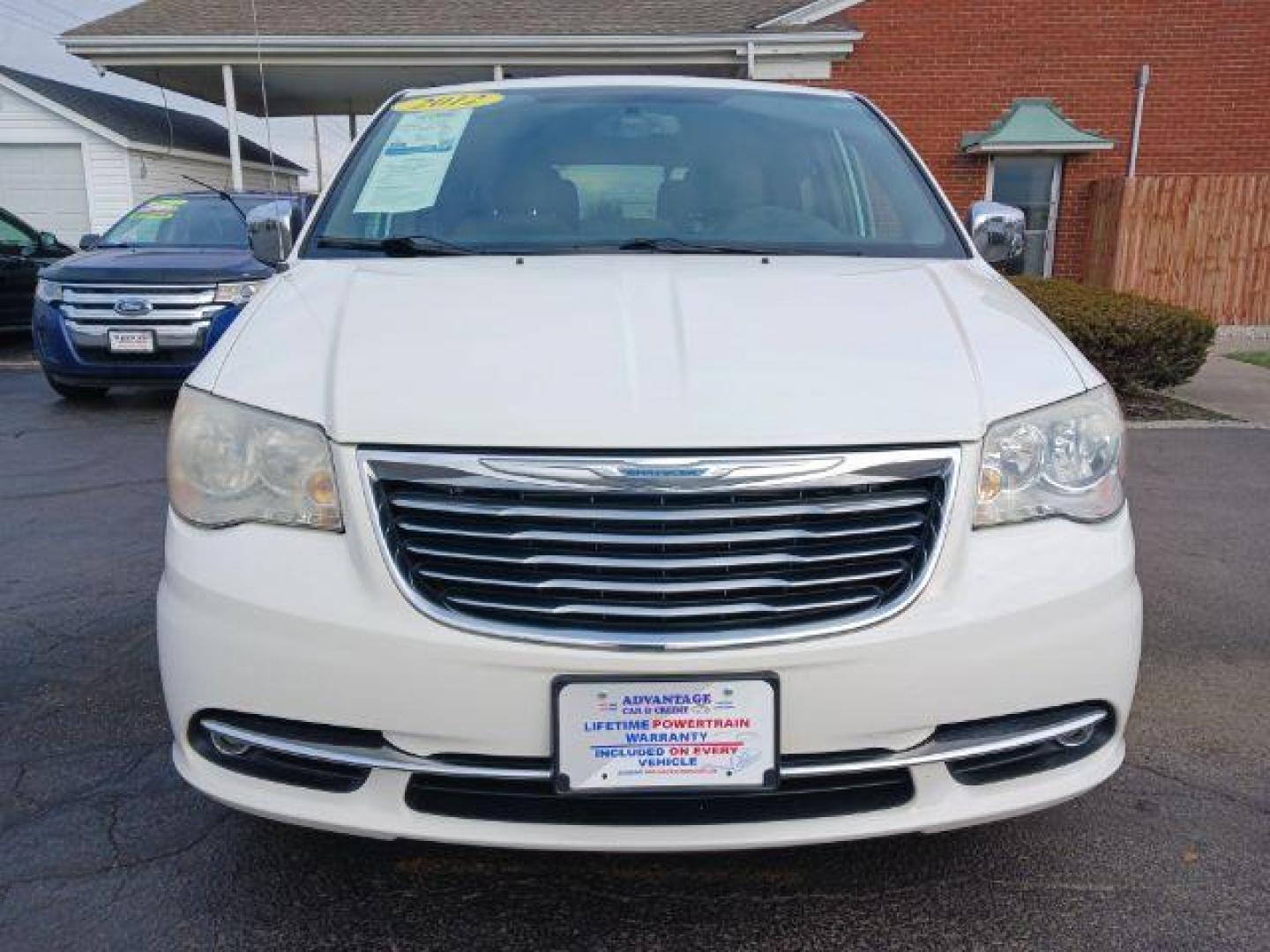 2012 Stone White Chrysler Town and Country Touring-L (2C4RC1CG4CR) with an 3.6L V6 DOHC 24V engine, 6-Speed Automatic transmission, located at 1184 Kauffman Ave, Fairborn, OH, 45324, (937) 908-9800, 39.807365, -84.029114 - Photo#1