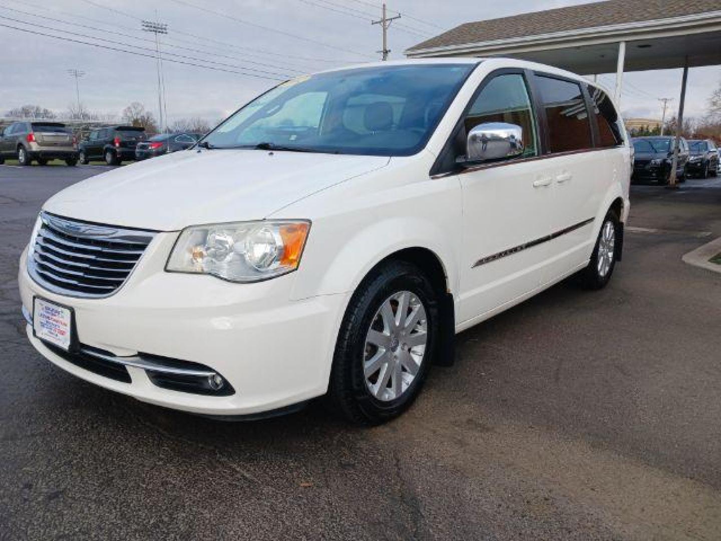 2012 Stone White Chrysler Town and Country Touring-L (2C4RC1CG4CR) with an 3.6L V6 DOHC 24V engine, 6-Speed Automatic transmission, located at 1184 Kauffman Ave, Fairborn, OH, 45324, (937) 908-9800, 39.807365, -84.029114 - Photo#2