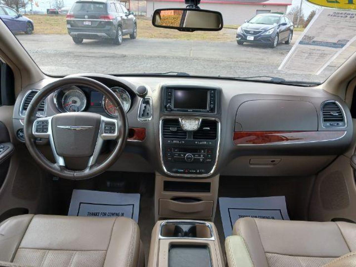 2012 Stone White Chrysler Town and Country Touring-L (2C4RC1CG4CR) with an 3.6L V6 DOHC 24V engine, 6-Speed Automatic transmission, located at 1184 Kauffman Ave, Fairborn, OH, 45324, (937) 908-9800, 39.807365, -84.029114 - Photo#7