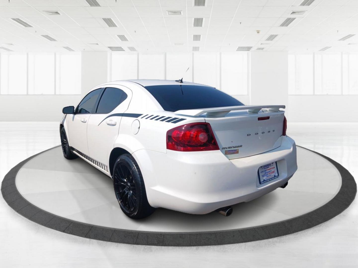 2012 Bright White Dodge Avenger (1C3CDZEG8CN) with an 3.6L V6 DOHC 24V FFV engine, 6-Speed Automatic transmission, located at 880 E. National Road, Vandalia, OH, 45377, (937) 908-9800, 39.892189, -84.181015 - Photo#4