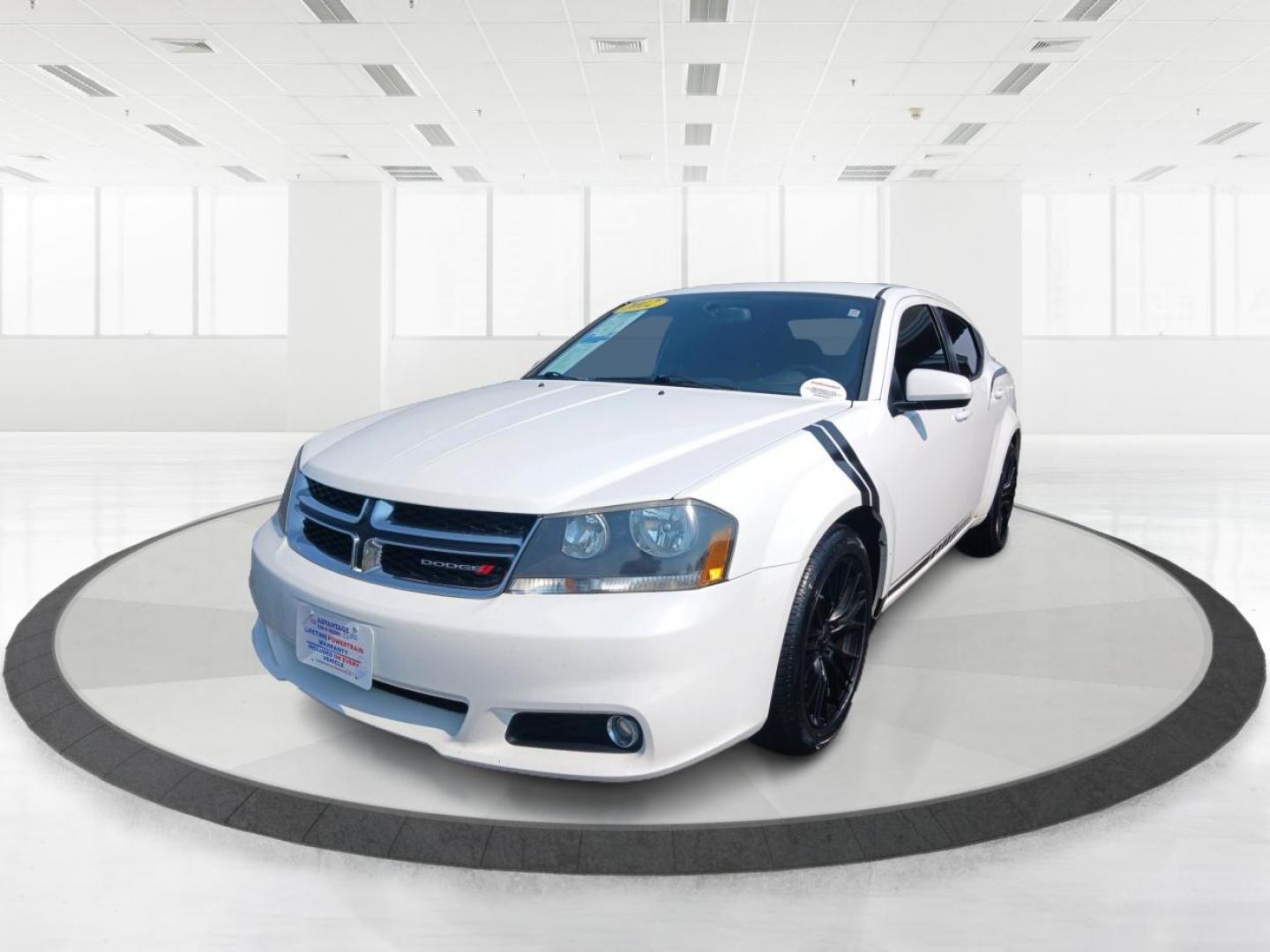 2012 Bright White Dodge Avenger (1C3CDZEG8CN) with an 3.6L V6 DOHC 24V FFV engine, 6-Speed Automatic transmission, located at 880 E. National Road, Vandalia, OH, 45377, (937) 908-9800, 39.892189, -84.181015 - Photo#7