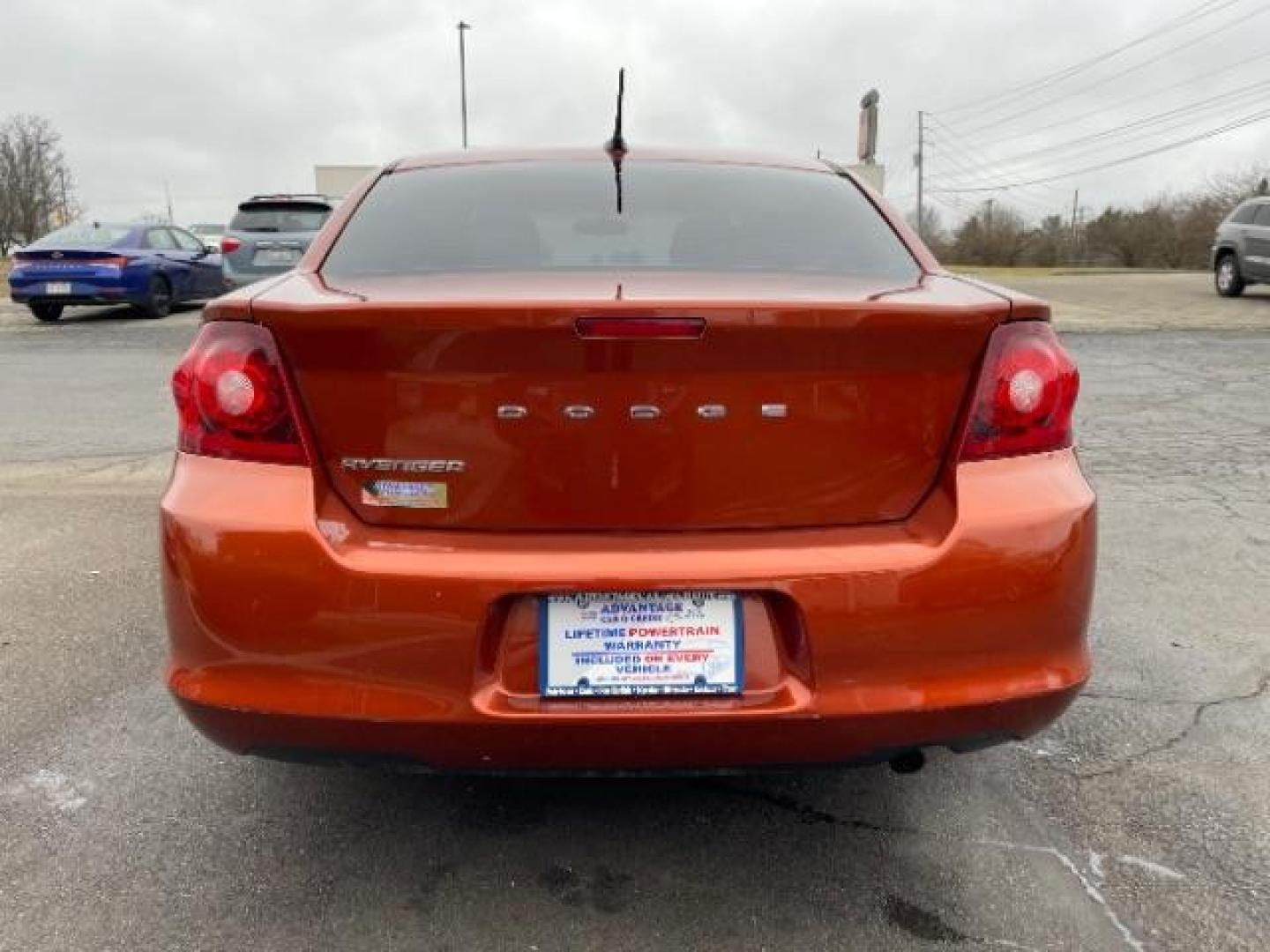 2012 Orange Dodge Avenger Base (1C3CDZAB1CN) with an 2.4L L4 DOHC 16V engine, 4-Speed Automatic transmission, located at 880 E. National Road, Vandalia, OH, 45377, (937) 908-9800, 39.892189, -84.181015 - Photo#4