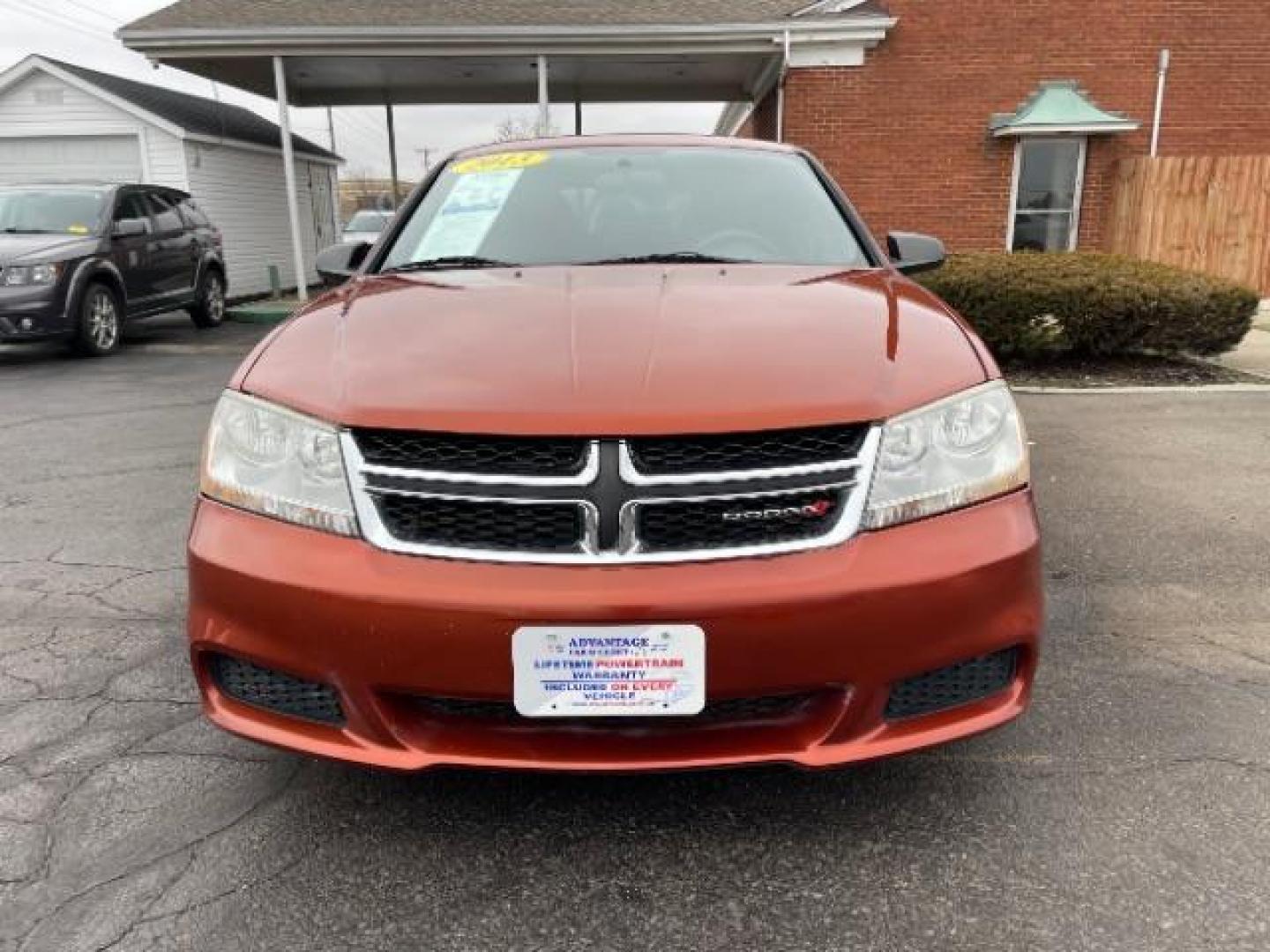 2012 Orange Dodge Avenger Base (1C3CDZAB1CN) with an 2.4L L4 DOHC 16V engine, 4-Speed Automatic transmission, located at 880 E. National Road, Vandalia, OH, 45377, (937) 908-9800, 39.892189, -84.181015 - Photo#5