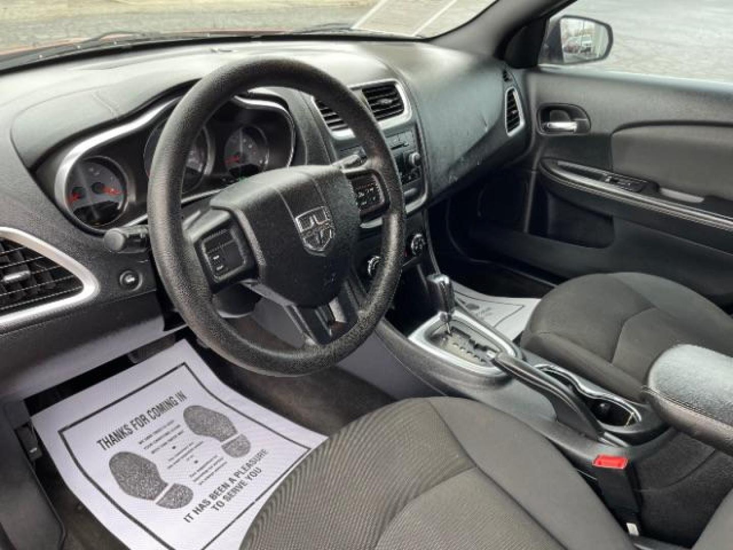 2012 Orange Dodge Avenger Base (1C3CDZAB1CN) with an 2.4L L4 DOHC 16V engine, 4-Speed Automatic transmission, located at 880 E. National Road, Vandalia, OH, 45377, (937) 908-9800, 39.892189, -84.181015 - Photo#6