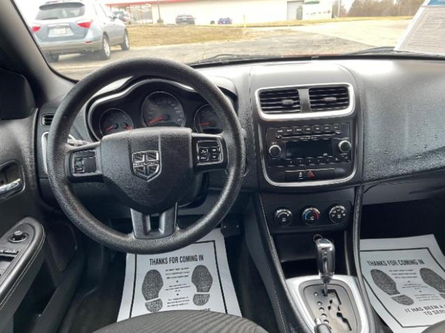 2012 Orange Dodge Avenger Base (1C3CDZAB1CN) with an 2.4L L4 DOHC 16V engine, 4-Speed Automatic transmission, located at 880 E. National Road, Vandalia, OH, 45377, (937) 908-9800, 39.892189, -84.181015 - Photo#7