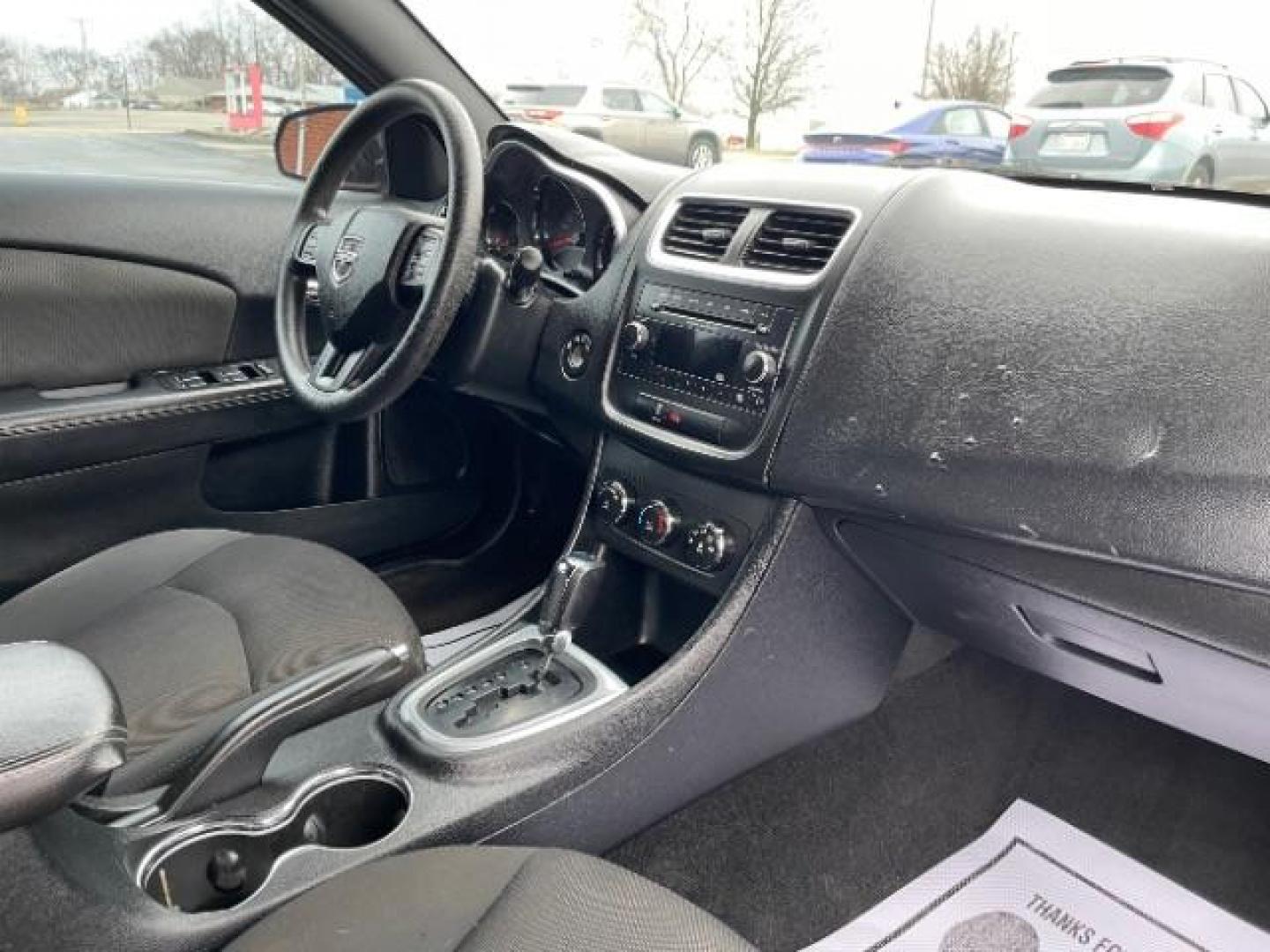 2012 Orange Dodge Avenger Base (1C3CDZAB1CN) with an 2.4L L4 DOHC 16V engine, 4-Speed Automatic transmission, located at 880 E. National Road, Vandalia, OH, 45377, (937) 908-9800, 39.892189, -84.181015 - Photo#8