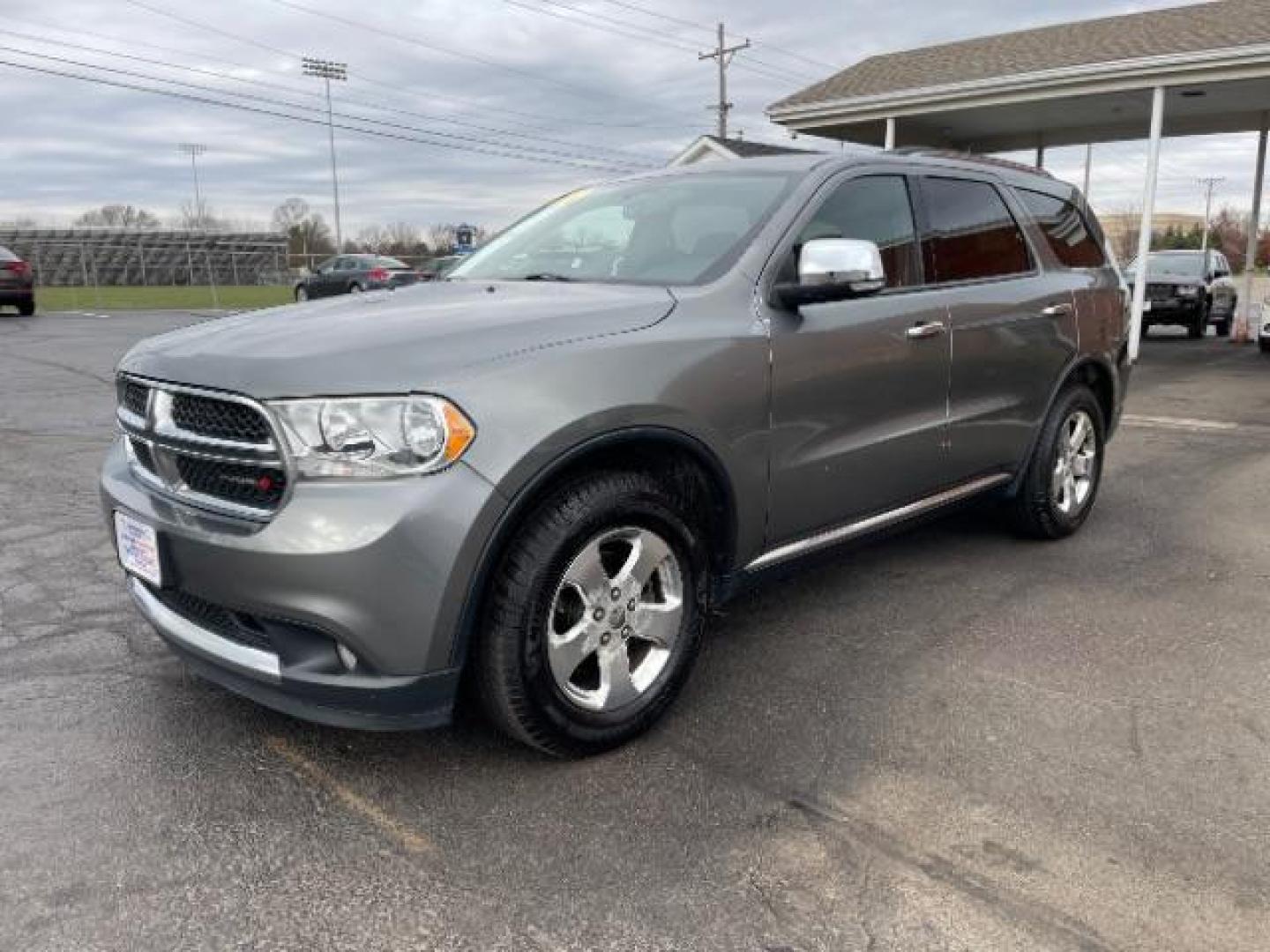 2012 Mineral Gray Metallic Dodge Durango Crew AWD (1C4RDJDG7CC) with an 3.6L V6 DOHC 24V engine, 5-Speed Automatic transmission, located at 1951 S Dayton Lakeview Rd., New Carlisle, OH, 45344, (937) 908-9800, 39.890999, -84.050255 - Photo#1