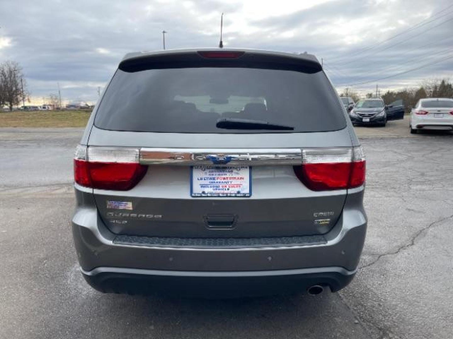 2012 Mineral Gray Metallic Dodge Durango Crew AWD (1C4RDJDG7CC) with an 3.6L V6 DOHC 24V engine, 5-Speed Automatic transmission, located at 1951 S Dayton Lakeview Rd., New Carlisle, OH, 45344, (937) 908-9800, 39.890999, -84.050255 - Photo#4