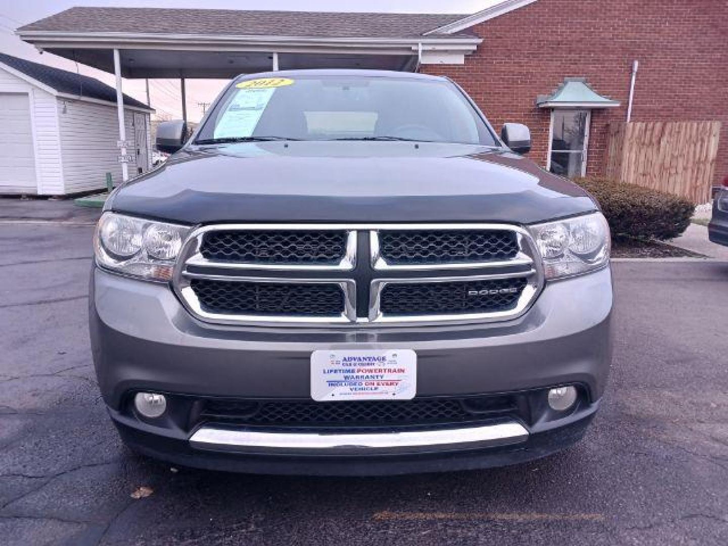 2012 Mineral Gray Metallic Dodge Durango SXT AWD (1C4RDJAGXCC) with an 3.6L V6 DOHC 24V engine, 5-Speed Automatic transmission, located at 1951 S Dayton Lakeview Rd., New Carlisle, OH, 45344, (937) 908-9800, 39.890999, -84.050255 - Photo#1