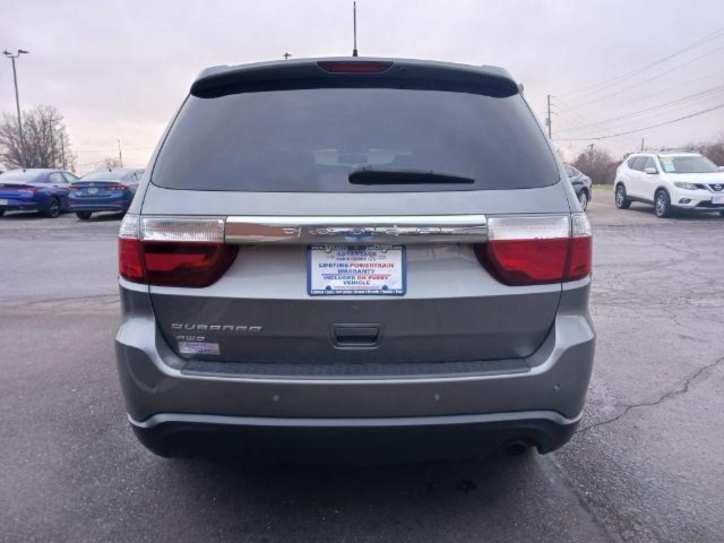 2012 Mineral Gray Metallic Dodge Durango SXT AWD (1C4RDJAGXCC) with an 3.6L V6 DOHC 24V engine, 5-Speed Automatic transmission, located at 1951 S Dayton Lakeview Rd., New Carlisle, OH, 45344, (937) 908-9800, 39.890999, -84.050255 - Photo#5