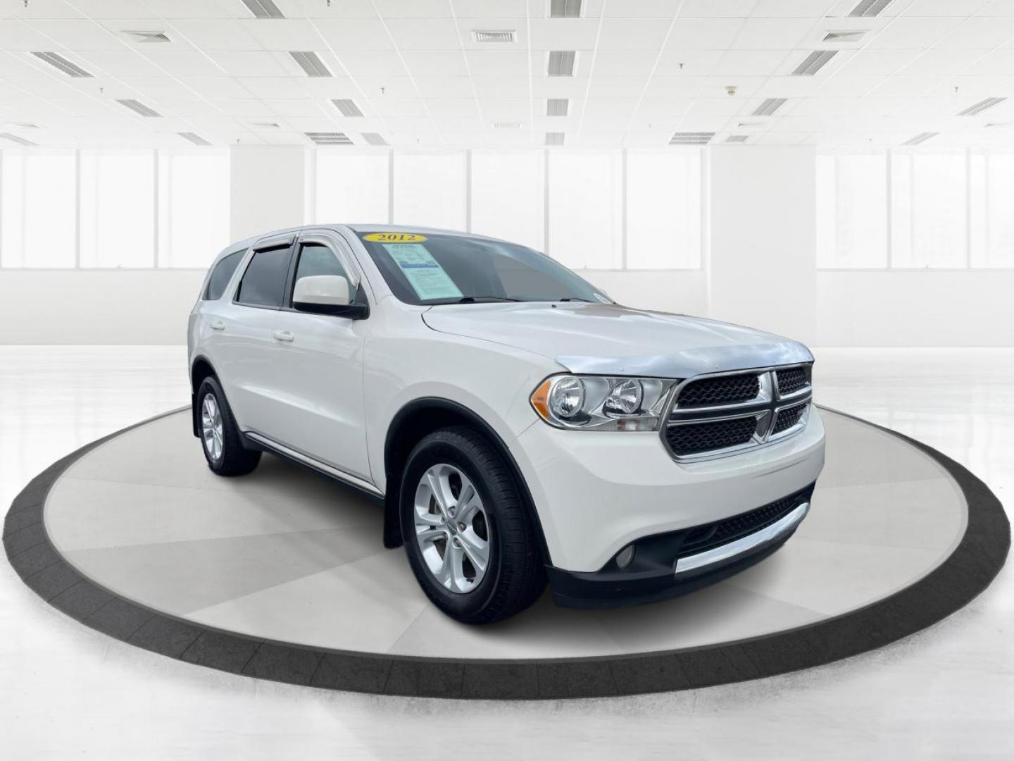 2012 Dodge Durango SXT AWD (1C4RDJAGXCC) with an 3.6L V6 DOHC 24V engine, 5-Speed Automatic transmission, located at 1184 Kauffman Ave, Fairborn, OH, 45324, (937) 908-9800, 39.807072, -84.030914 - Third Row - Photo#0