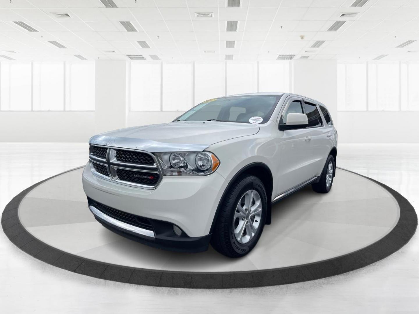 2012 Dodge Durango SXT AWD (1C4RDJAGXCC) with an 3.6L V6 DOHC 24V engine, 5-Speed Automatic transmission, located at 1184 Kauffman Ave, Fairborn, OH, 45324, (937) 908-9800, 39.807072, -84.030914 - Third Row - Photo#7