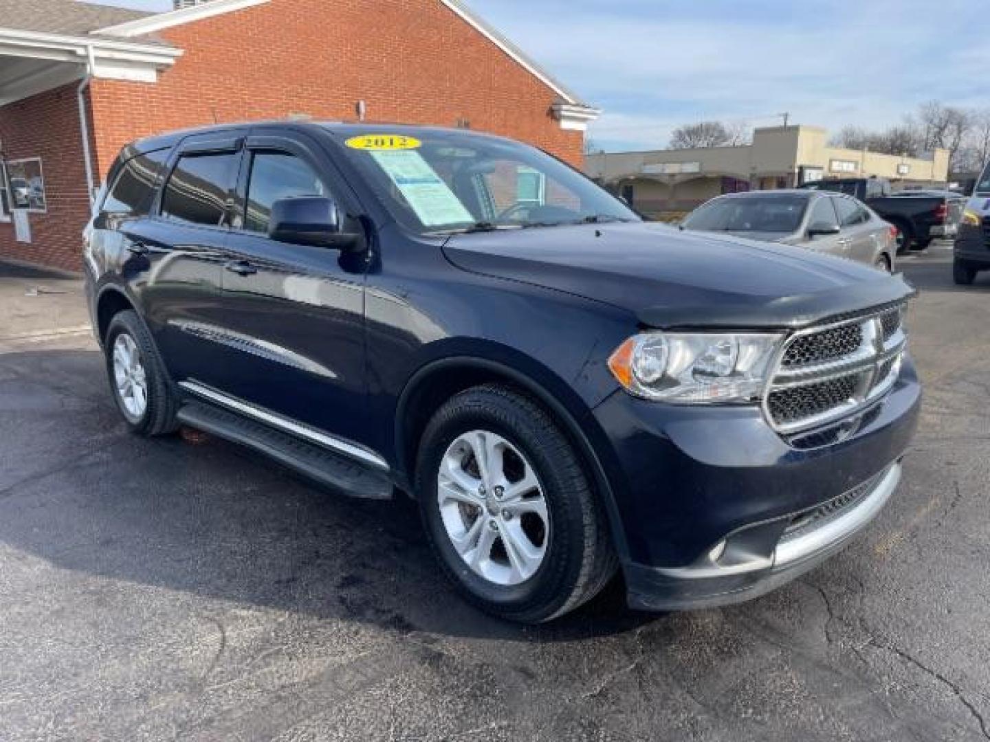 2012 True Blue Pearl Dodge Durango SXT AWD (1C4RDJAGXCC) with an 3.6L V6 DOHC 24V engine, 5-Speed Automatic transmission, located at 401 Woodman Dr, Riverside, OH, 45431, (937) 908-9800, 39.763779, -84.122063 - Photo#0