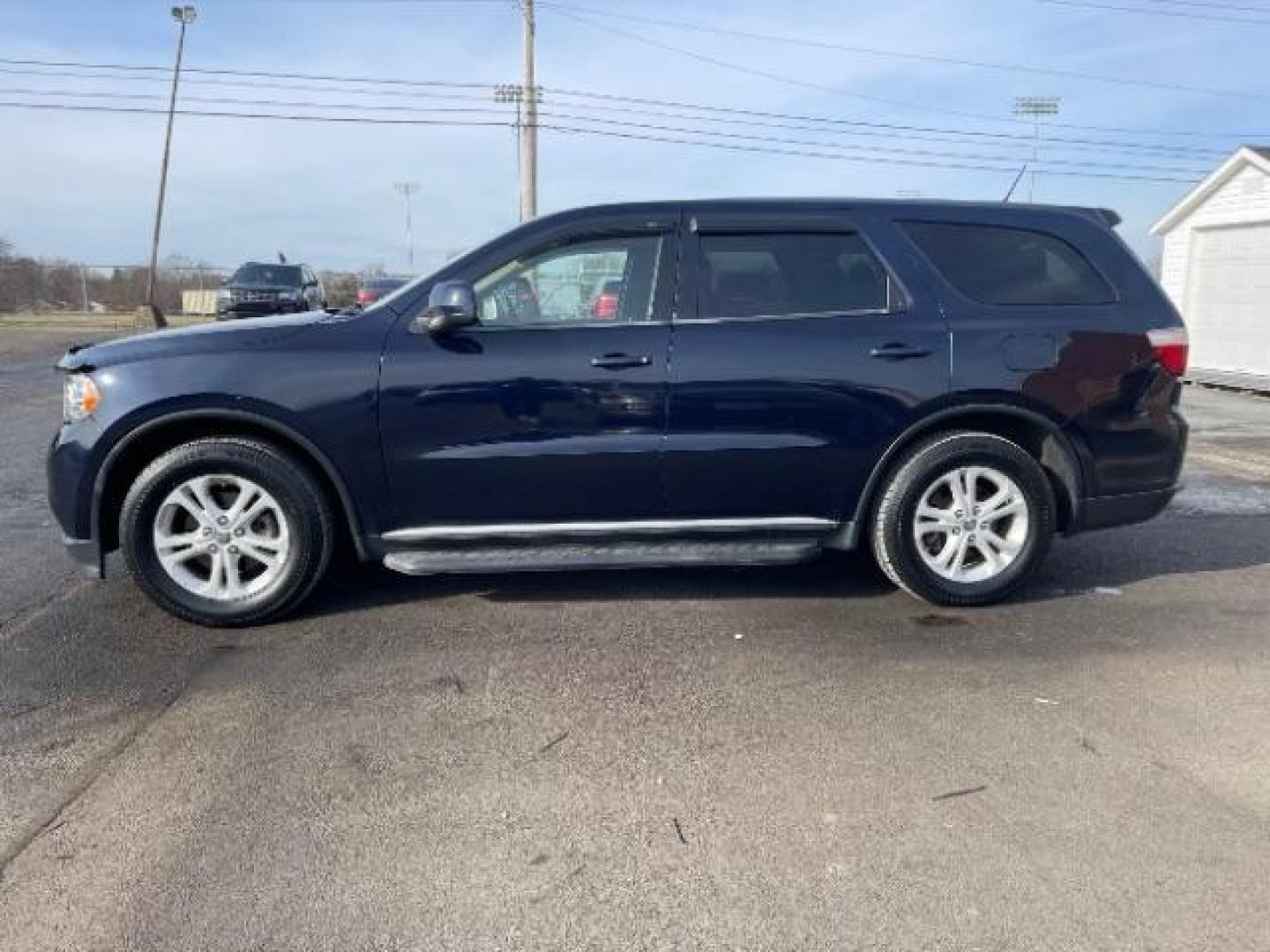 2012 True Blue Pearl Dodge Durango SXT AWD (1C4RDJAGXCC) with an 3.6L V6 DOHC 24V engine, 5-Speed Automatic transmission, located at 401 Woodman Dr, Riverside, OH, 45431, (937) 908-9800, 39.763779, -84.122063 - Photo#3