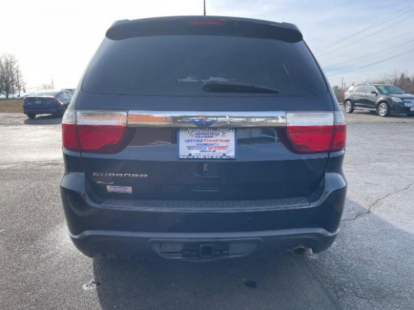 2012 True Blue Pearl Dodge Durango SXT AWD (1C4RDJAGXCC) with an 3.6L V6 DOHC 24V engine, 5-Speed Automatic transmission, located at 401 Woodman Dr, Riverside, OH, 45431, (937) 908-9800, 39.763779, -84.122063 - Photo#5