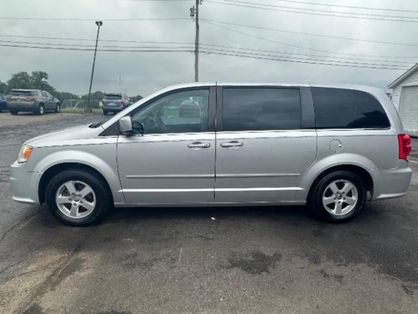 2012 Bright Silver Metallic Dodge Grand Caravan Crew (2C4RDGDGXCR) with an 3.6L V6 DOHC 24V engine, 6-Speed Automatic transmission, located at 880 E. National Road, Vandalia, OH, 45377, (937) 908-9800, 39.892189, -84.181015 - Photo#3