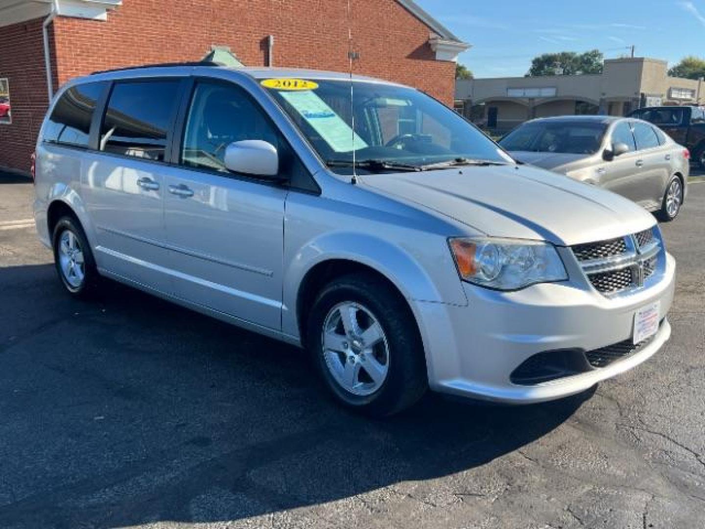 2012 Bright Silver Metallic Dodge Grand Caravan SXT (2C4RDGCG8CR) with an 3.6L V6 DOHC 24V engine, 6-Speed Automatic transmission, located at 4508 South Dixie Dr, Moraine, OH, 45439, (937) 908-9800, 39.690136, -84.216438 - Photo#0