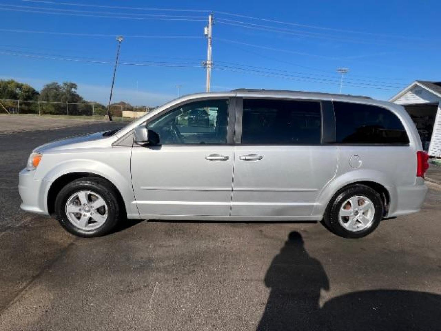 2012 Bright Silver Metallic Dodge Grand Caravan SXT (2C4RDGCG8CR) with an 3.6L V6 DOHC 24V engine, 6-Speed Automatic transmission, located at 4508 South Dixie Dr, Moraine, OH, 45439, (937) 908-9800, 39.690136, -84.216438 - Photo#3