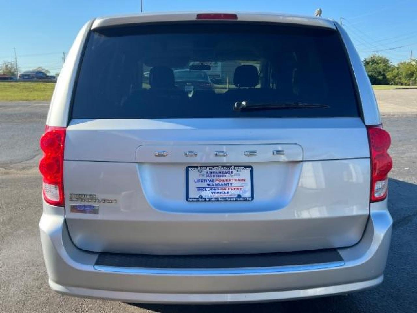 2012 Bright Silver Metallic Dodge Grand Caravan SXT (2C4RDGCG8CR) with an 3.6L V6 DOHC 24V engine, 6-Speed Automatic transmission, located at 4508 South Dixie Dr, Moraine, OH, 45439, (937) 908-9800, 39.690136, -84.216438 - Photo#4