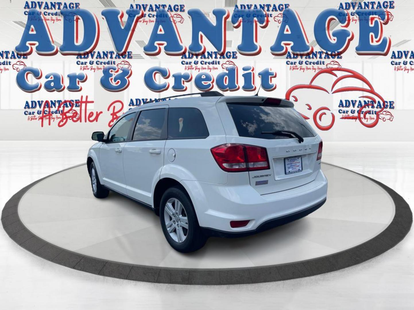 2012 White Dodge Journey (3C4PDCBB6CT) with an 2.4L L6 DOHC 16V engine, 6-Speed Automatic transmission, located at 1230 East Main St, Xenia, OH, 45385, (937) 908-9800, 39.687321, -83.910294 - Photo#4