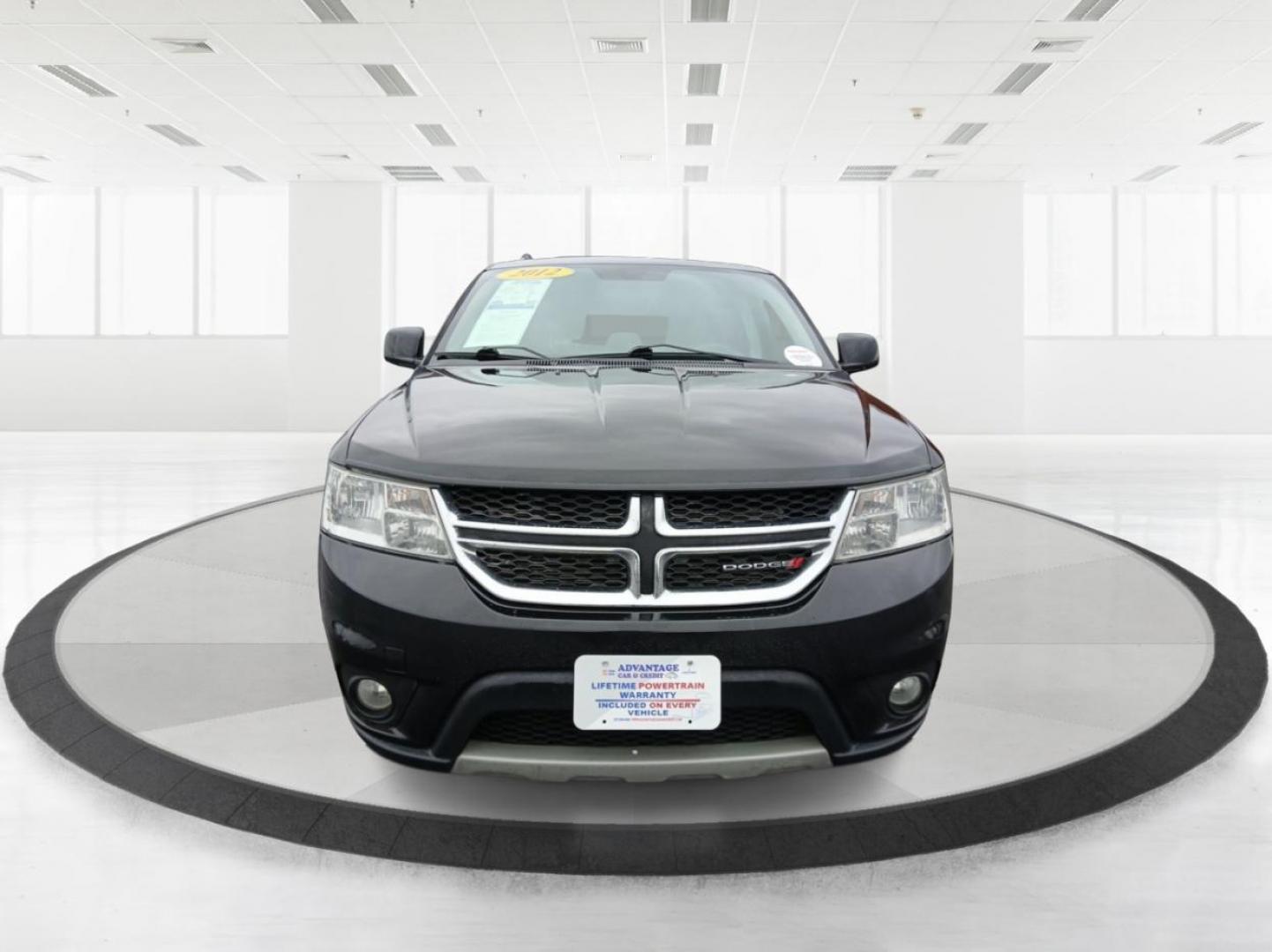 2012 Brilliant Black Crystal Pearl Dodge Journey SXT (3C4PDCBB6CT) with an 2.4L L6 DOHC 16V engine, 4-Speed Automatic transmission, located at 8750 N County Rd 25A, Piqua, OH, 45356, (937) 908-9800, 40.164391, -84.232513 - Photo#6