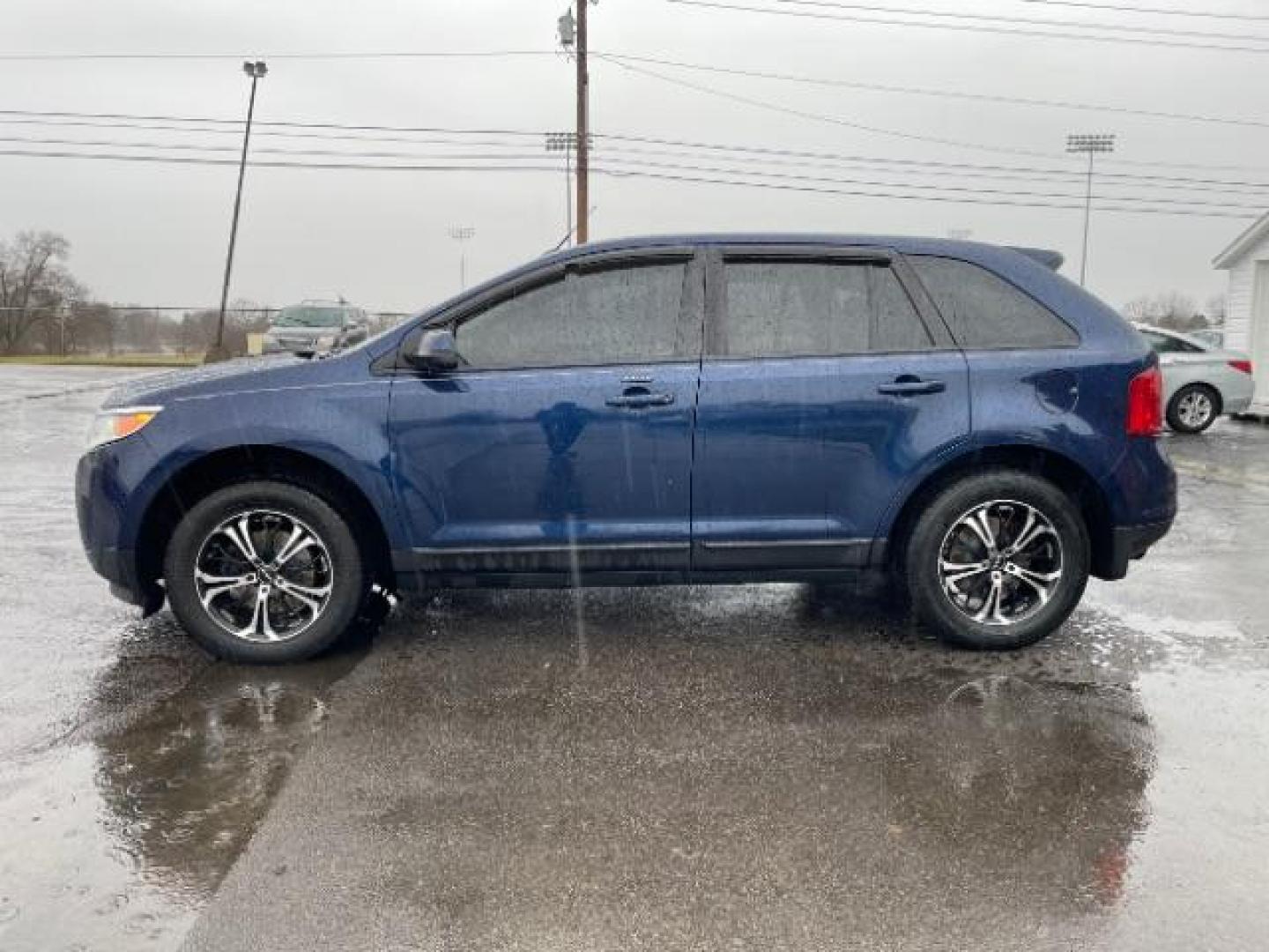 2012 Dark Blue Pearl Metallic Ford Edge SEL FWD (2FMDK3JC7CB) with an 3.5L V6 DOHC 24V engine, 6-Speed Automatic transmission, located at 401 Woodman Dr, Riverside, OH, 45431, (937) 908-9800, 39.763779, -84.122063 - Photo#2