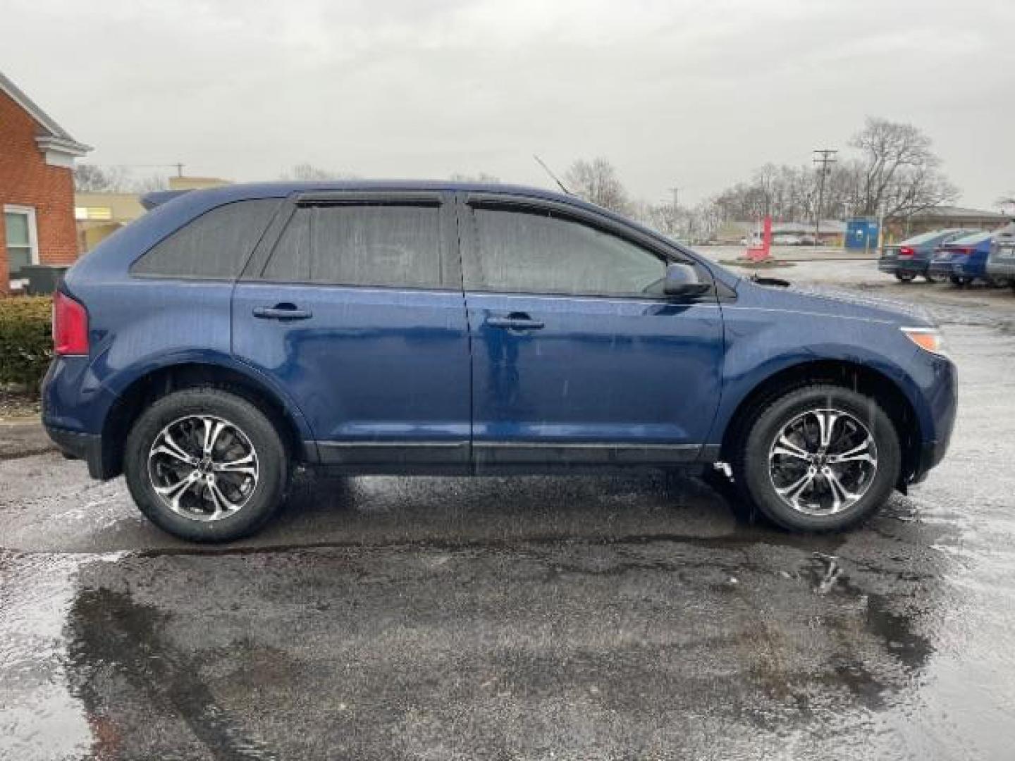 2012 Dark Blue Pearl Metallic Ford Edge SEL FWD (2FMDK3JC7CB) with an 3.5L V6 DOHC 24V engine, 6-Speed Automatic transmission, located at 401 Woodman Dr, Riverside, OH, 45431, (937) 908-9800, 39.763779, -84.122063 - Photo#3