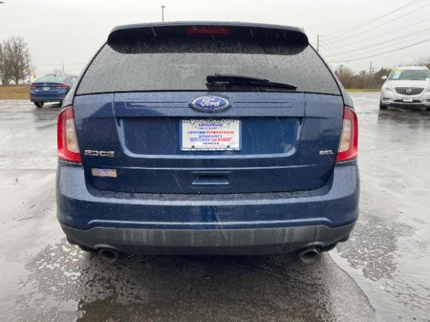 2012 Dark Blue Pearl Metallic Ford Edge SEL FWD (2FMDK3JC7CB) with an 3.5L V6 DOHC 24V engine, 6-Speed Automatic transmission, located at 401 Woodman Dr, Riverside, OH, 45431, (937) 908-9800, 39.763779, -84.122063 - Photo#4