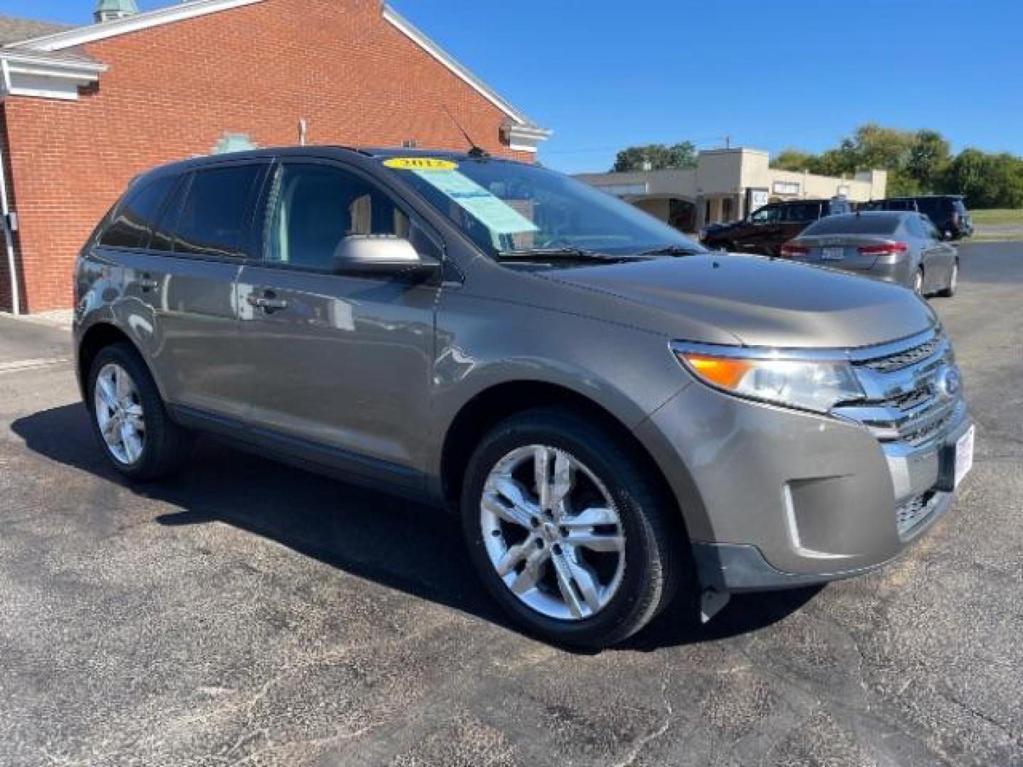 2012 Ginger Ale Metallic Ford Edge SEL FWD (2FMDK3JCXCB) with an 3.5L V6 DOHC 24V engine, 6-Speed Automatic transmission, located at 4508 South Dixie Dr, Moraine, OH, 45439, (937) 908-9800, 39.690136, -84.216438 - Photo#0