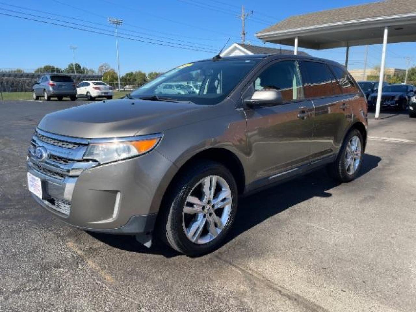 2012 Ginger Ale Metallic Ford Edge SEL FWD (2FMDK3JCXCB) with an 3.5L V6 DOHC 24V engine, 6-Speed Automatic transmission, located at 4508 South Dixie Dr, Moraine, OH, 45439, (937) 908-9800, 39.690136, -84.216438 - Photo#1