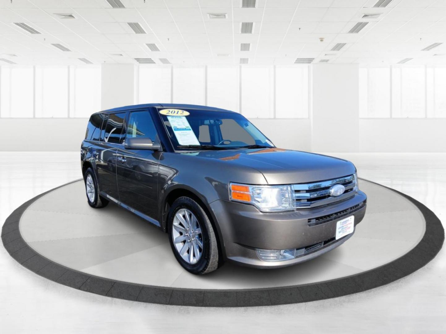 2012 Ford Flex SEL FWD (2FMGK5CC2CB) with an 3.5L V6 DOHC 24V engine, 6-Speed Automatic Overdrive transmission, located at 880 E. National Road, Vandalia, OH, 45377, (937) 908-9800, 39.891918, -84.183594 - Third Row - Photo#0