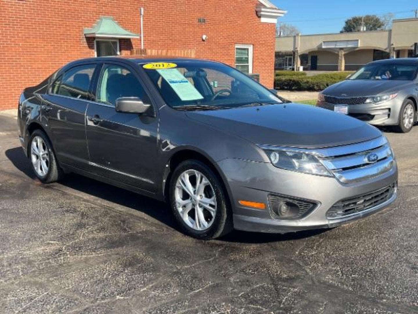 2012 Sterling Gray Metallic Ford Fusion SE (3FAHP0HA5CR) with an 2.5L L4 DOHC 16V engine, located at 880 E. National Road, Vandalia, OH, 45377, (937) 908-9800, 39.892189, -84.181015 - Photo#0